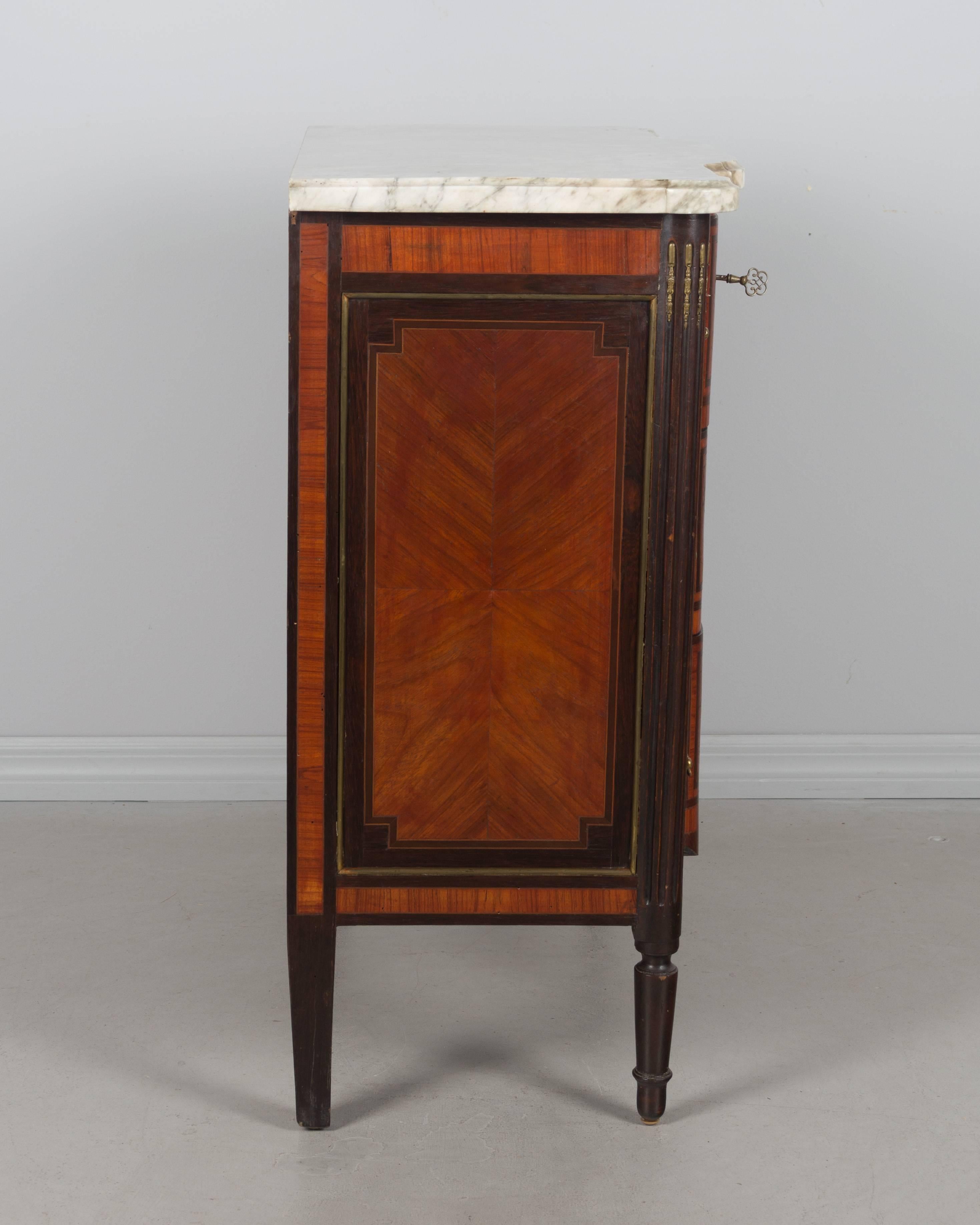 French Louis XVI Style Marquetry Commode In Excellent Condition In Winter Park, FL