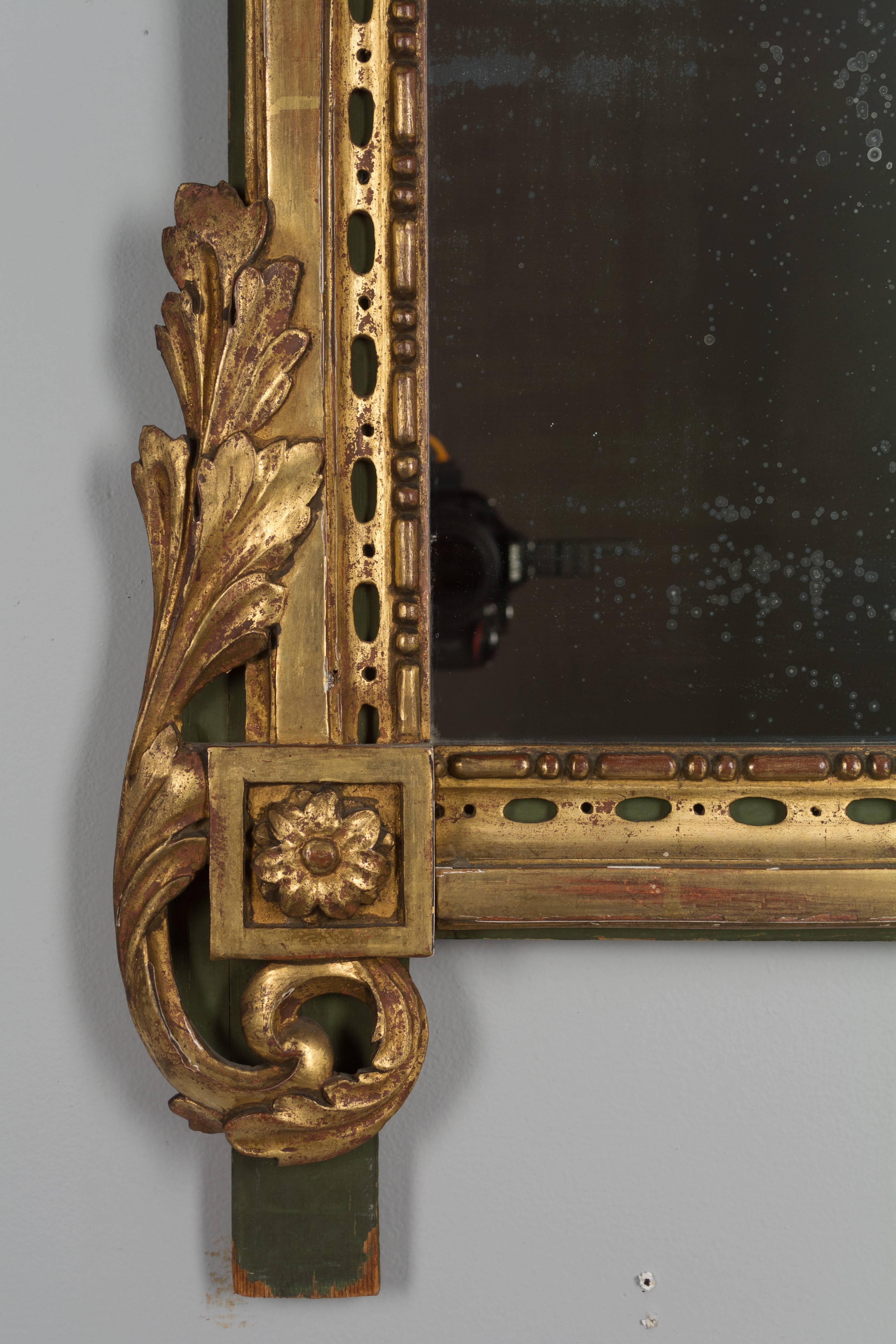 Giltwood 19th Century French Régence Style Parcel-Gilt Mirror