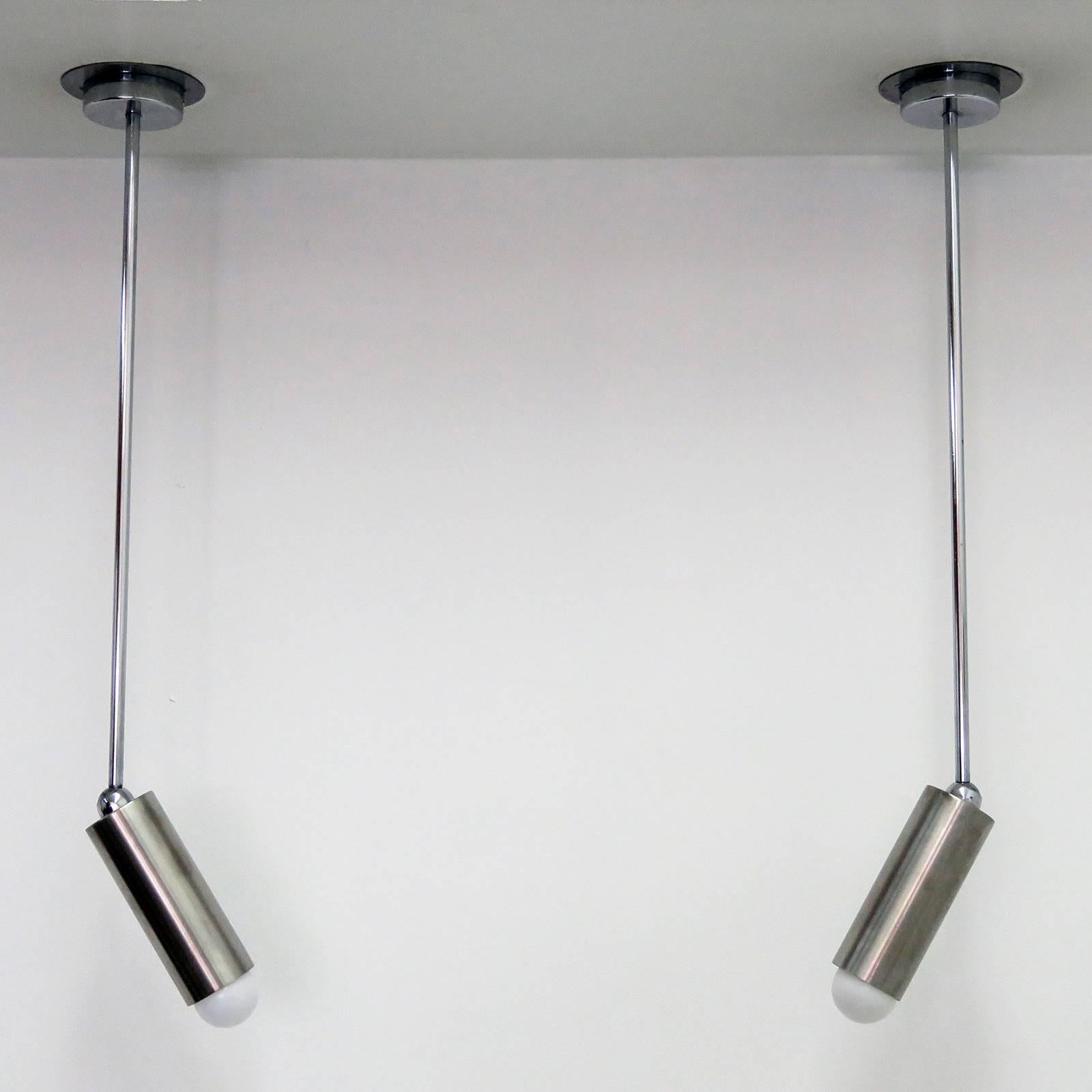 Striking pair of French long stem wall/ceiling lights by Parscot, brushed aluminium bodies on a ball joint for Directional lighting.