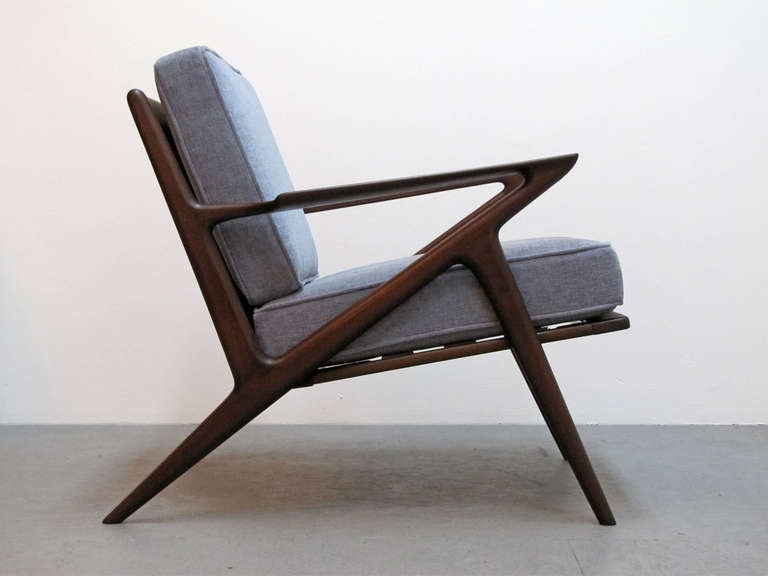 Sculptural pair of walnut armchairs by Poul Jensen for Selig, new blue or grey upholstery and new original Fagas straps, marked.