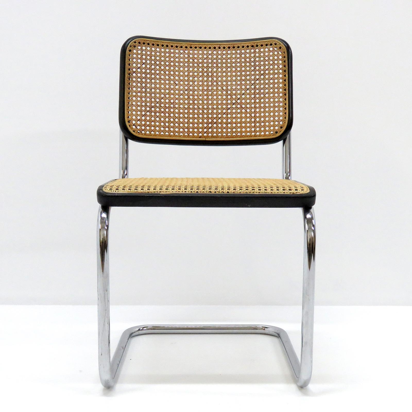 Great examples of 1977 side chairs Model S32 by Marcel Breuer for Thonet, tubular steel with painted black wood framed and cane for the seat and back rest, marked.
