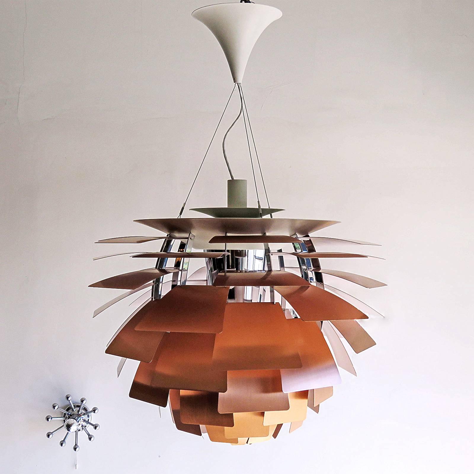 Vintage iconic brushed copper hanging pendant lamp by Poul Henningsen, manufactured by Louis Poulsen, Denmark. PH Artichoke (1958) is a 360-degree glare free luminaire created by 72 copper leaves, which shield the light source, redirect and reflect