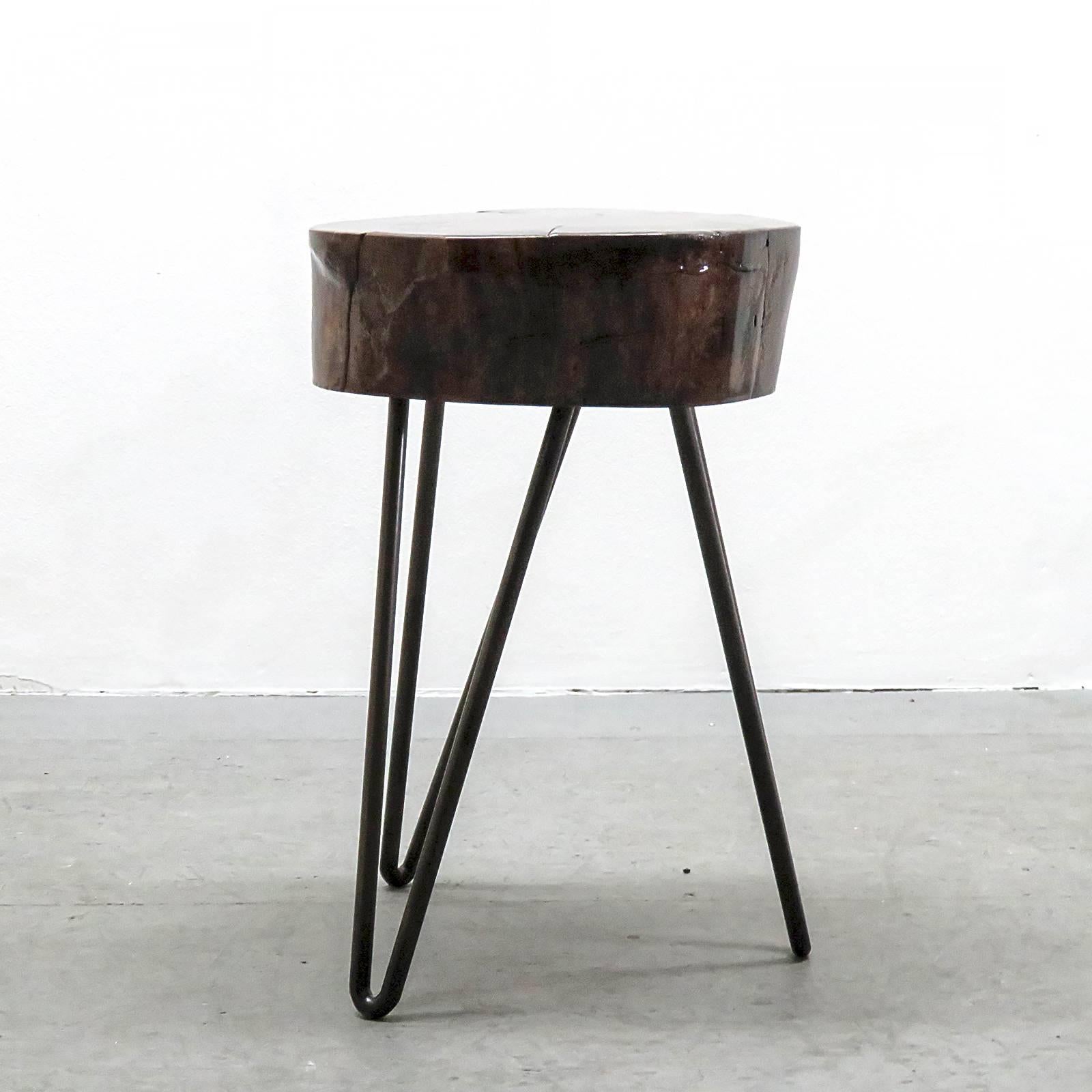 Wonderful live edge, lacquered wood tripod side tables on asymmetrical wrought iron hair pin legs by Artist Christoff van Kooning, limited edition, due to the nature of the handmade process, sizes and wood grain vary within reason.