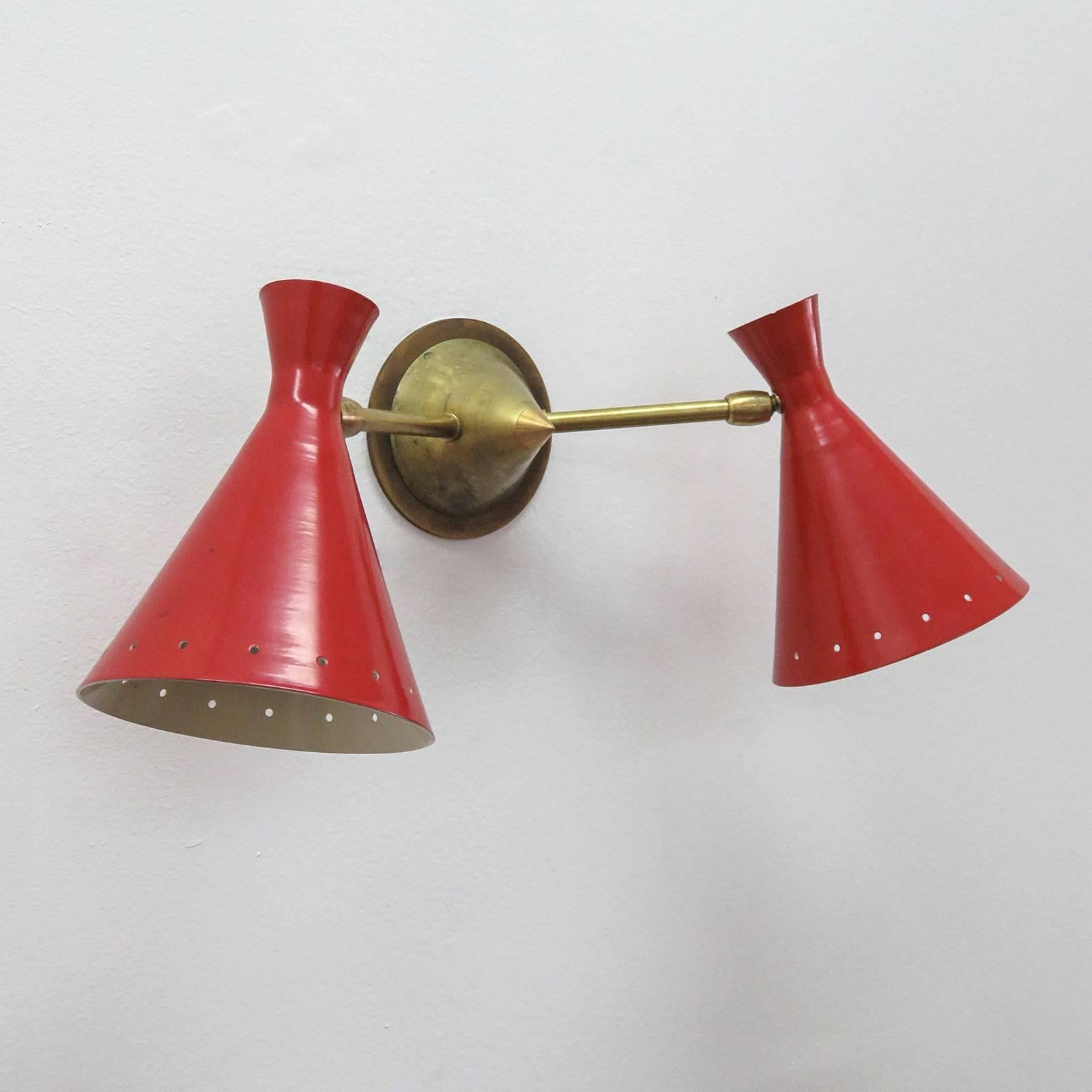 Wonderful articulate Italian double wall lights in black, white and red, double cones with perforations along the bottom rim.
*Black sconce has sold
