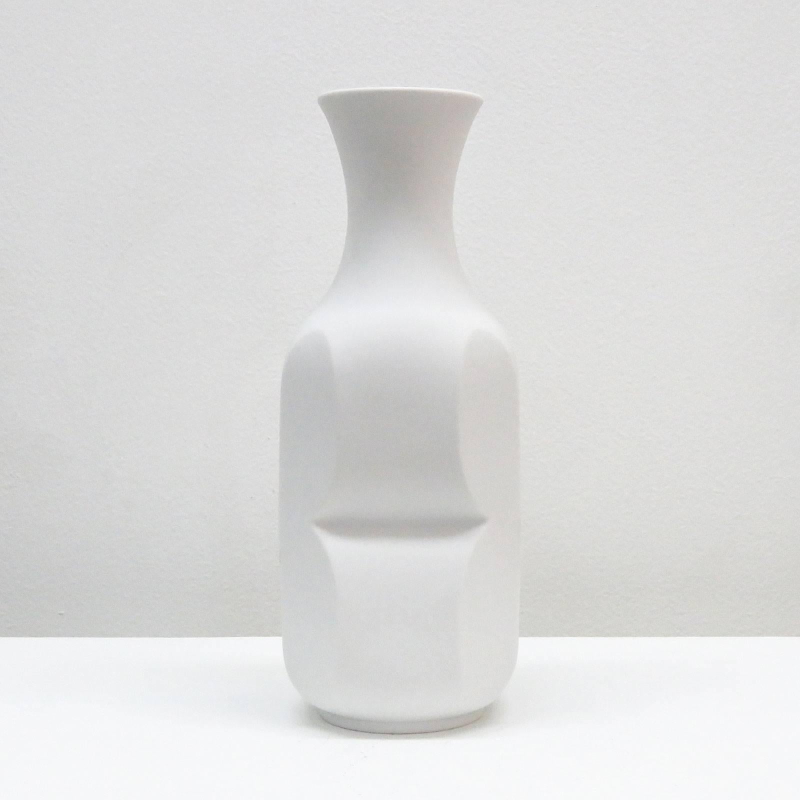 Sculptural porcelaiin vase by Heinrich Fuchs for Hutschenreuther with bisque exterior and glazed interior, released between 1968 and 1970, marked.