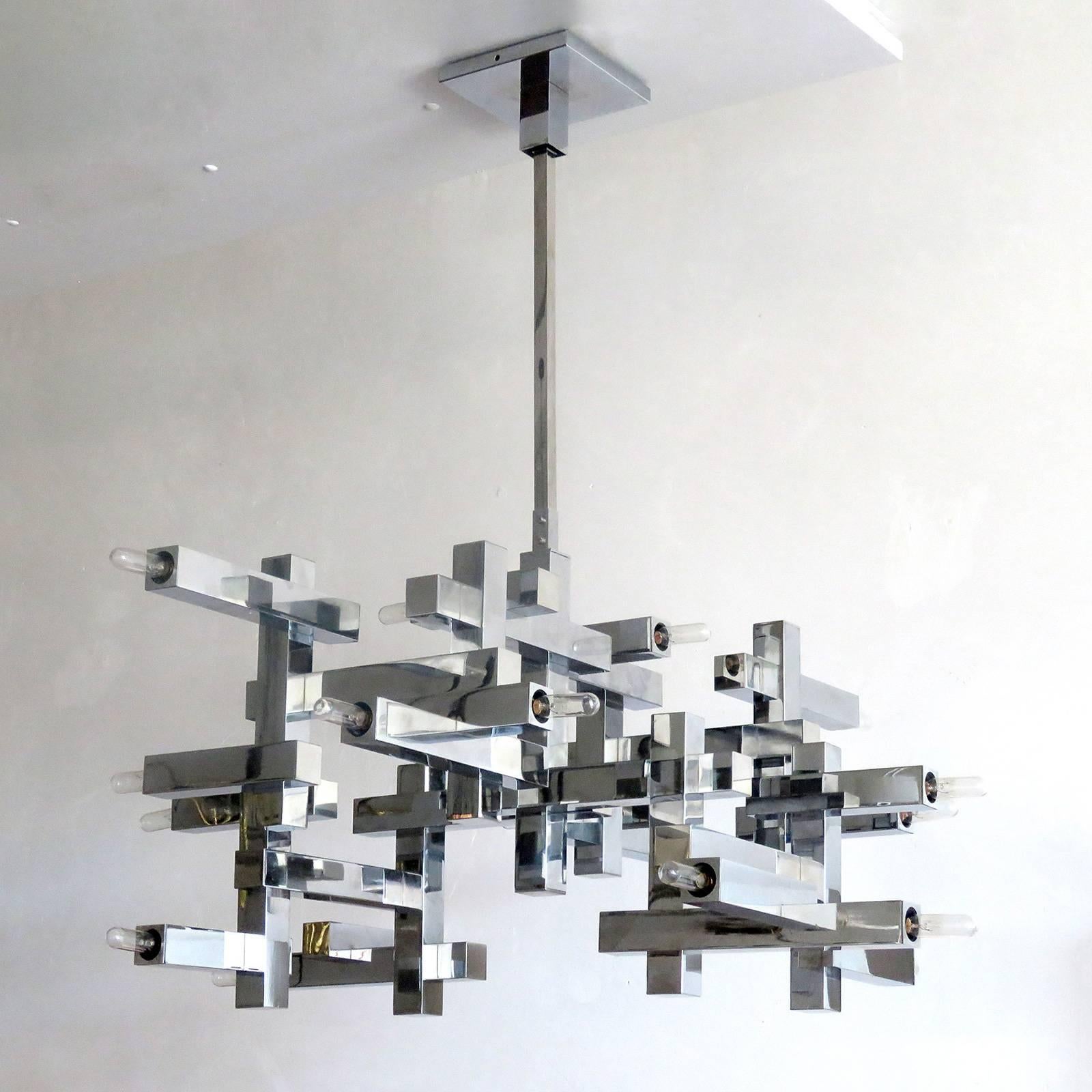 Stunning extra large "Metric" chandelier by Gaetano Sciolari, Italy, 1960, in chrome-plated steel, eighteen sockets, great condition, fully original with optional 9" rod extension for an overall height of 45", marked.