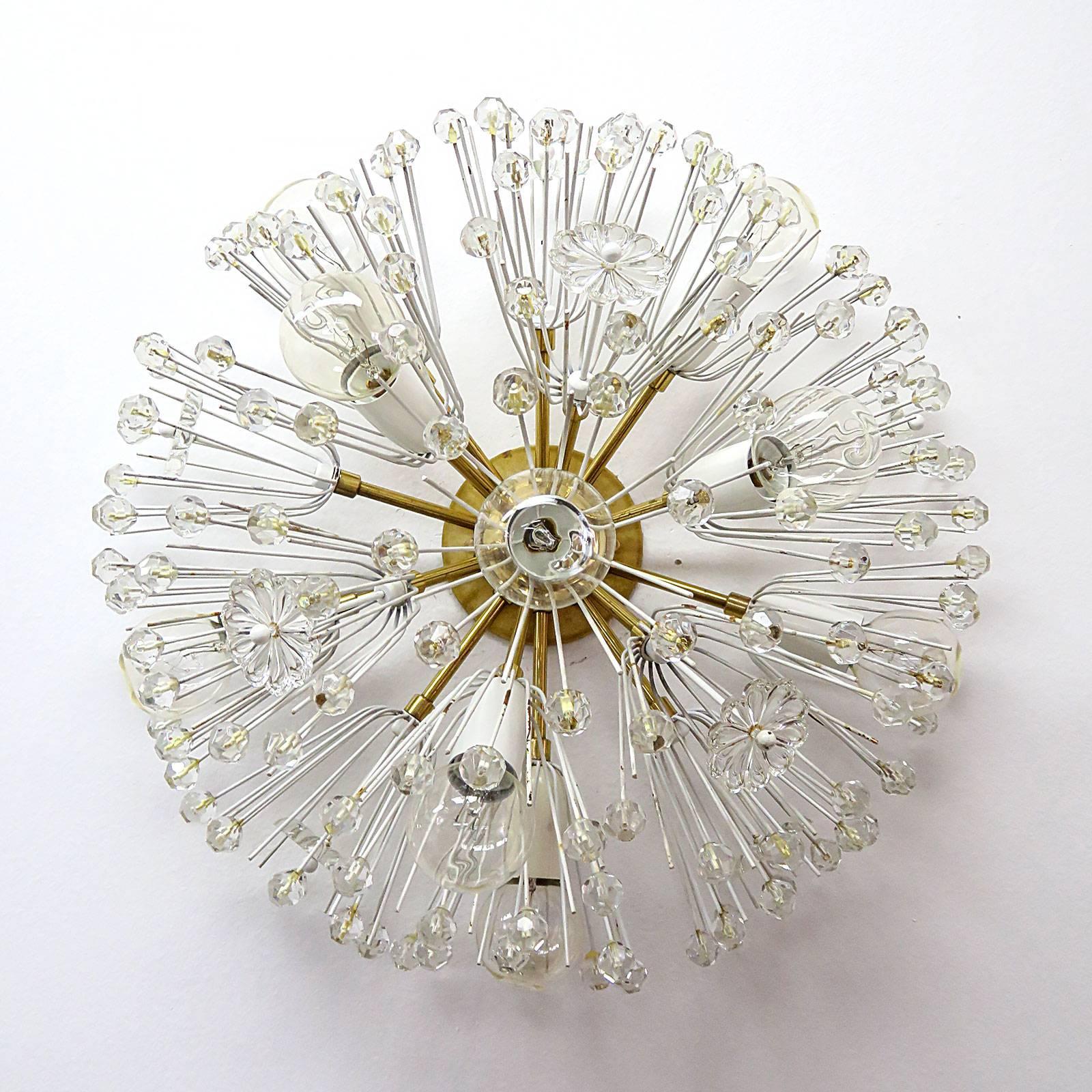 Beautiful and delicate nine-light brass fixture with copious amounts of Austrian crystals by Emil Stejnar for Nikoll, can be wall or ceiling mounted.
