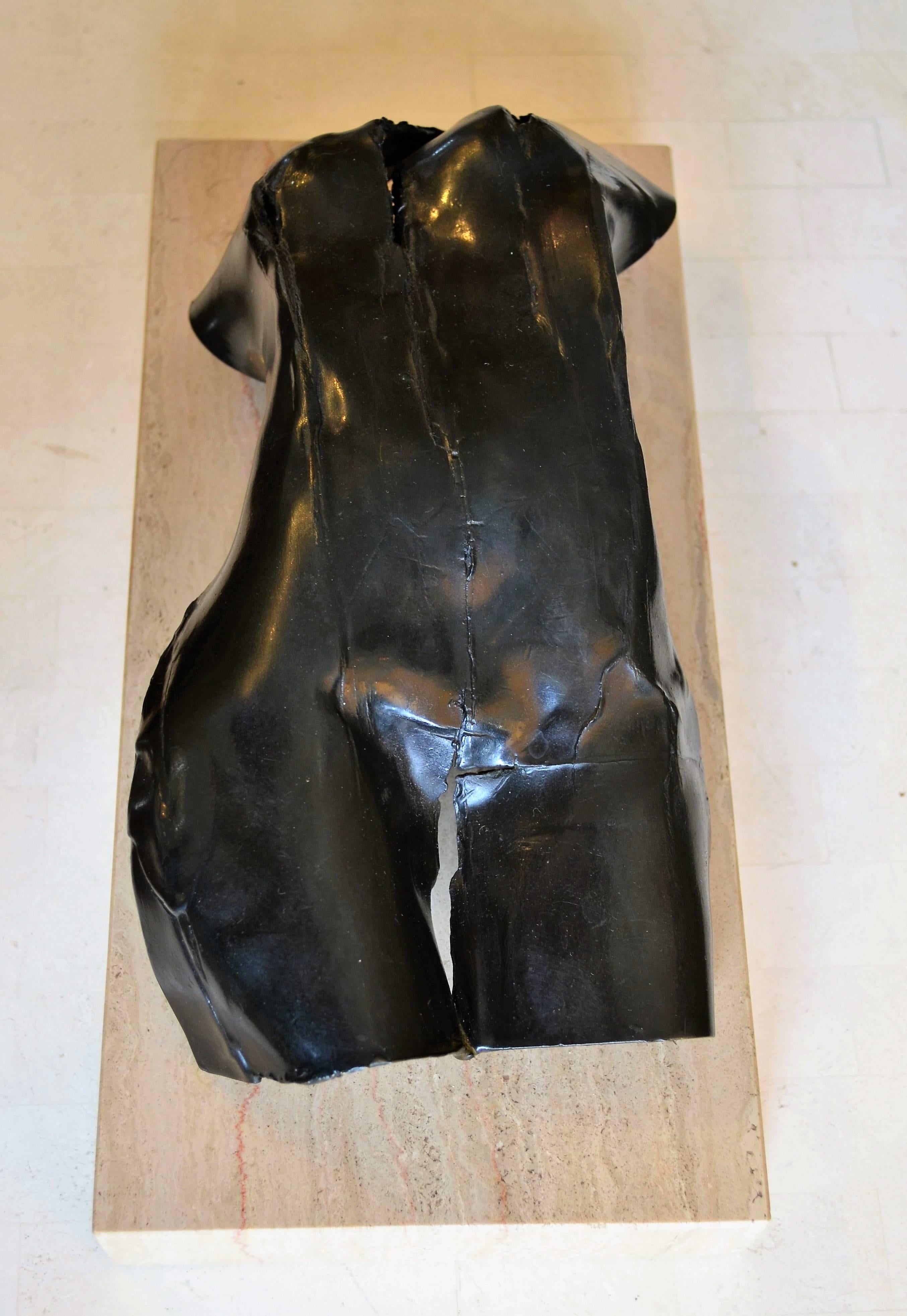 A figural recumbent female bronze nude sculpture.
The sculpture is signed Liberton and is mounted on a marble base.