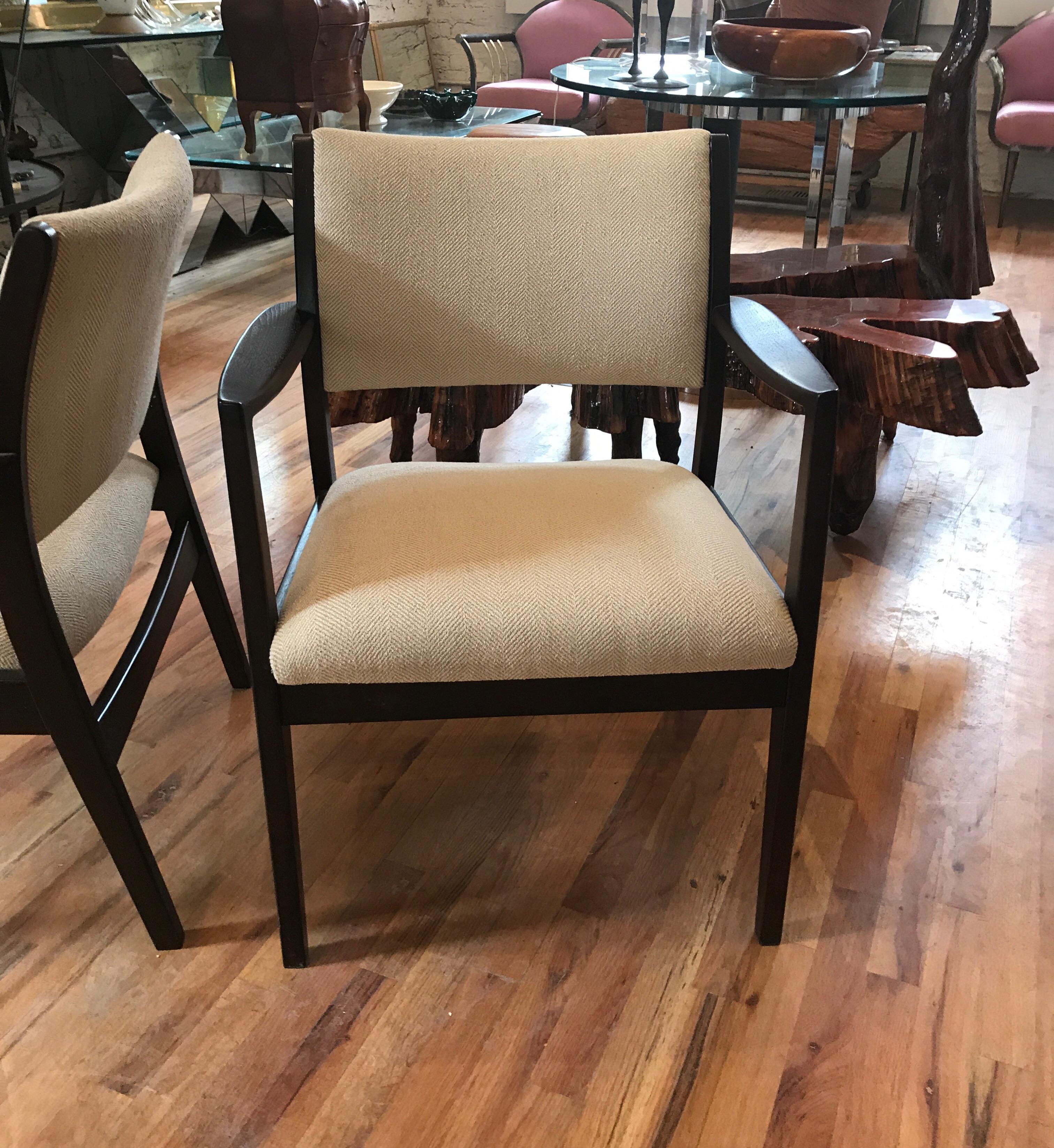 Pair of Jens Risom style Mid Century lounge chairs designed by George Reinoehl for Stow Davis.
The chairs frames are finished in a rich ebonized walnut.