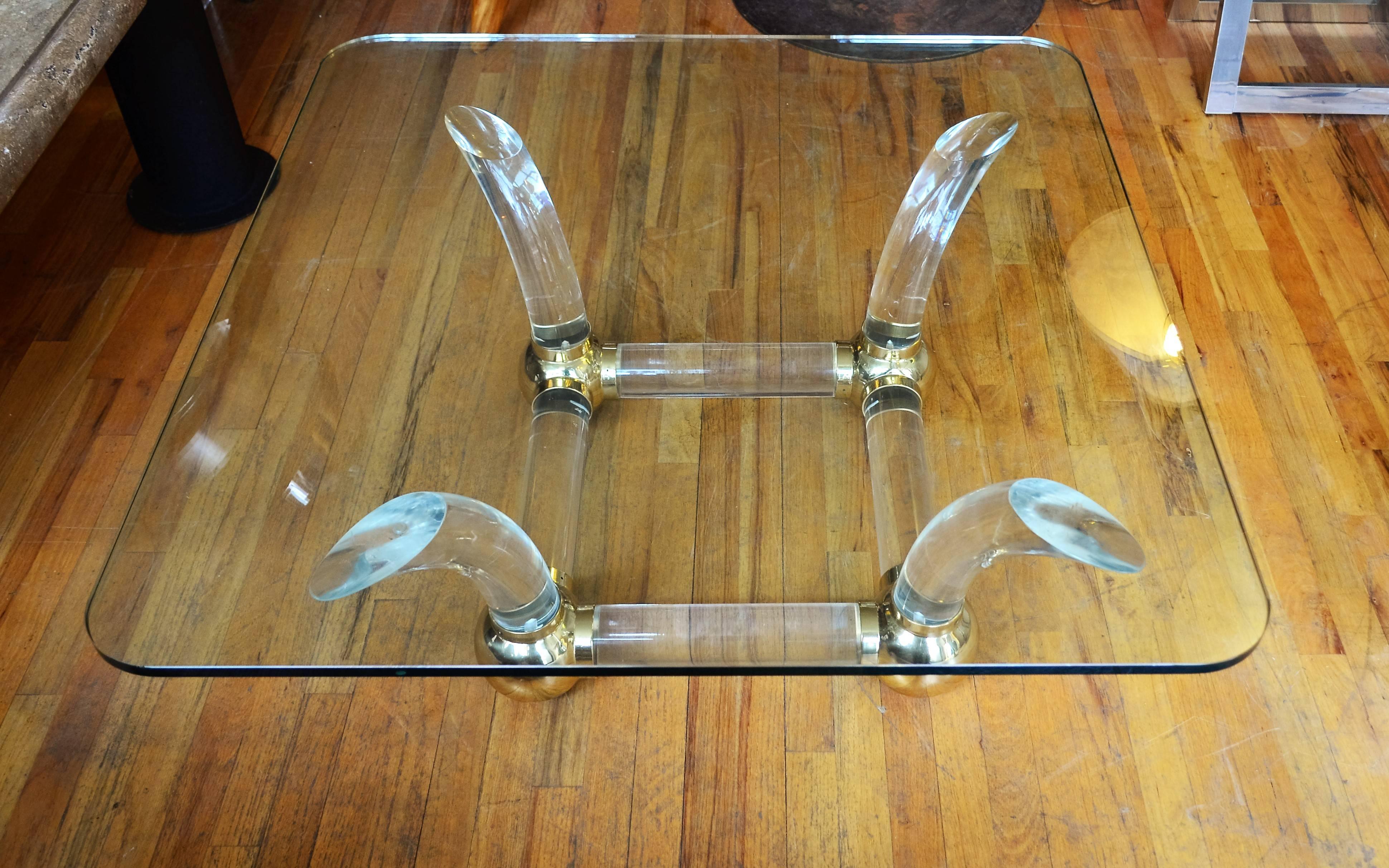 brass and acrylic coffee table