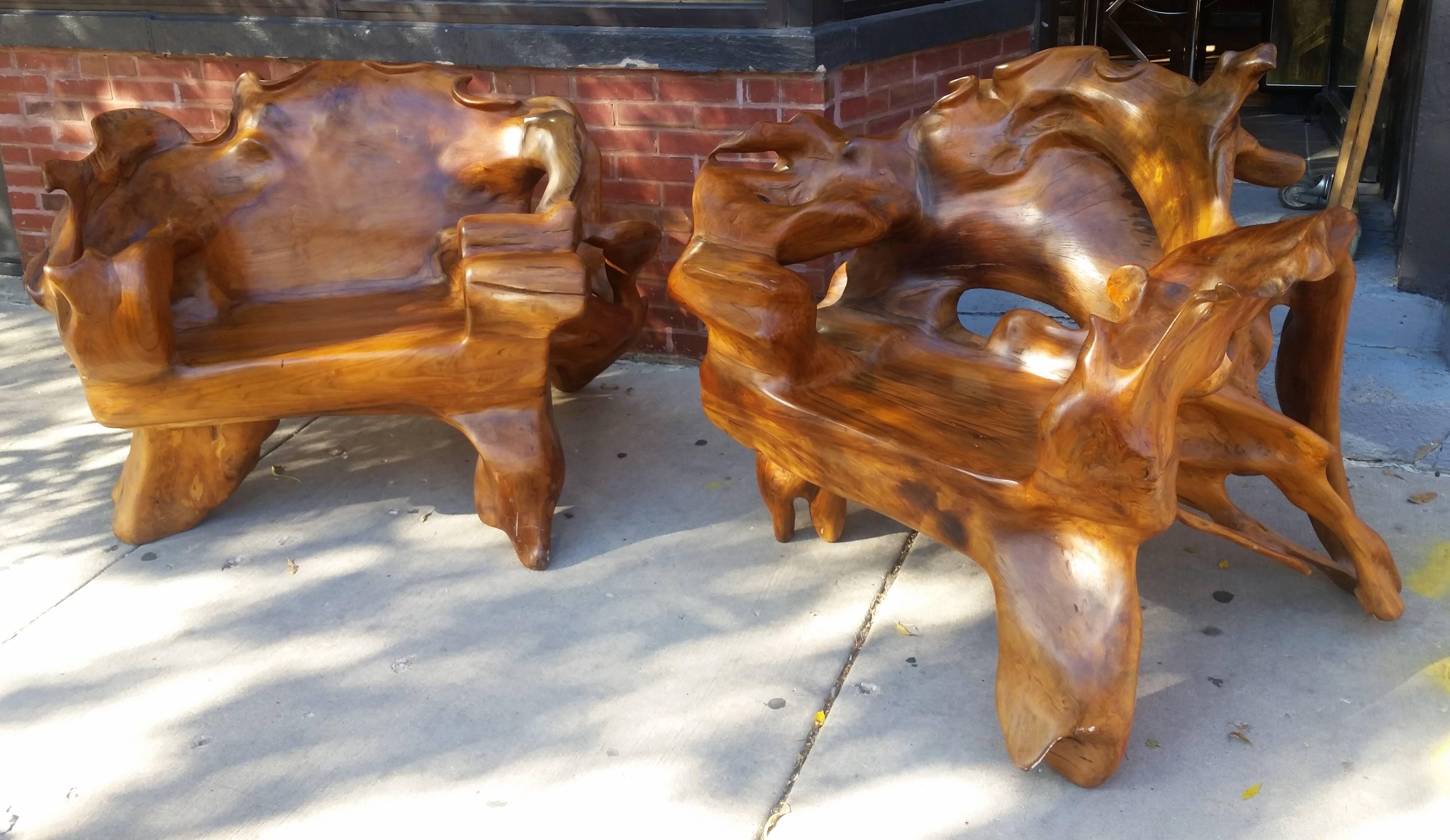An exceptionally large one of a kind suite of highly sculptural American Studio Craft furniture.
Though unsigned these expertly handcrafted chairs and table were created by a master artisan. The monumental proportions are very much in the manner of