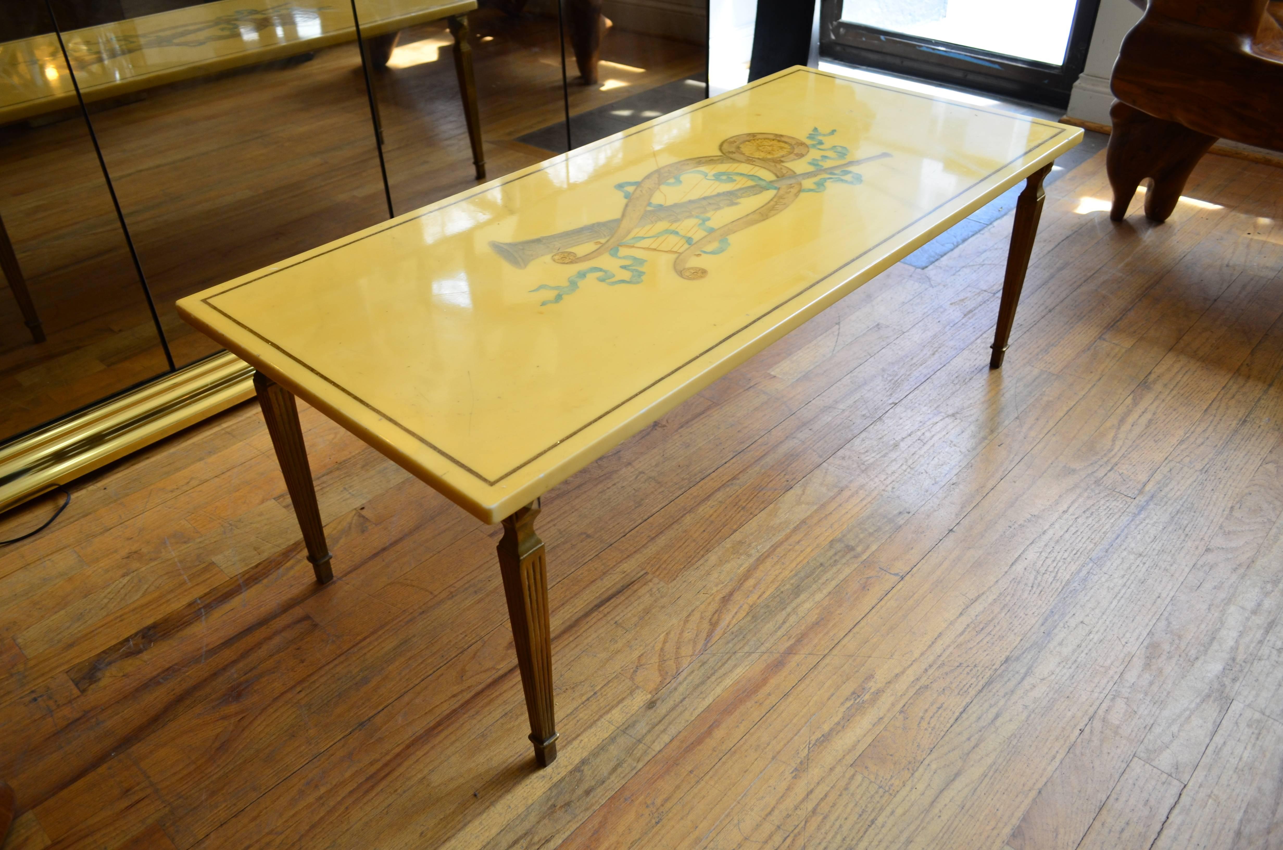 Marble coffee table with bronze legs by Emilio Martelli. Original label.