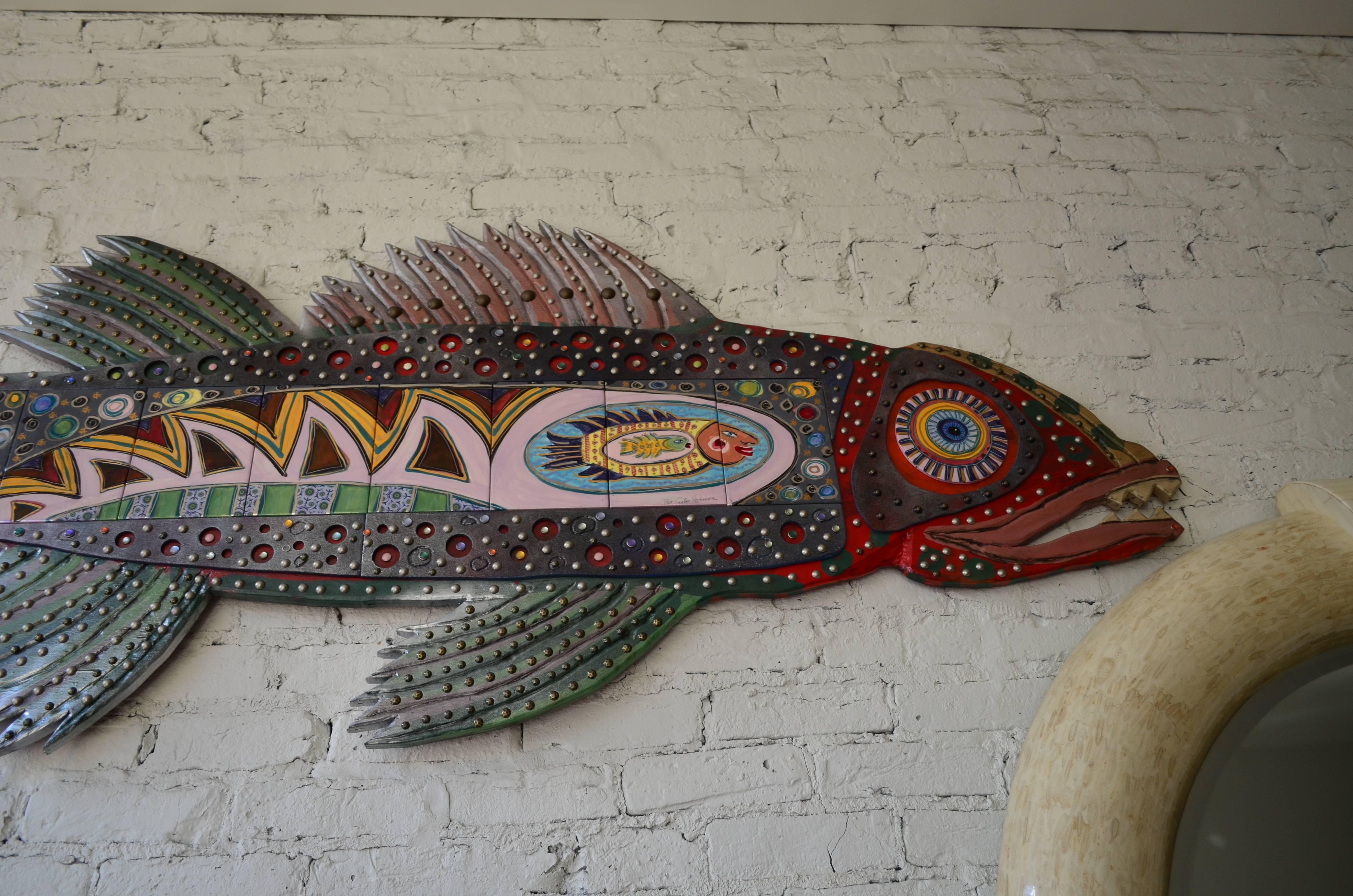 A fantastic large-scale seven foot long ceramic and carved wood
fish by noted artists Pat Custer Denison and
Chip Denison. This talented husband and wife duo
create unique wood and tile combination art.
Their one of a kind art incorporates