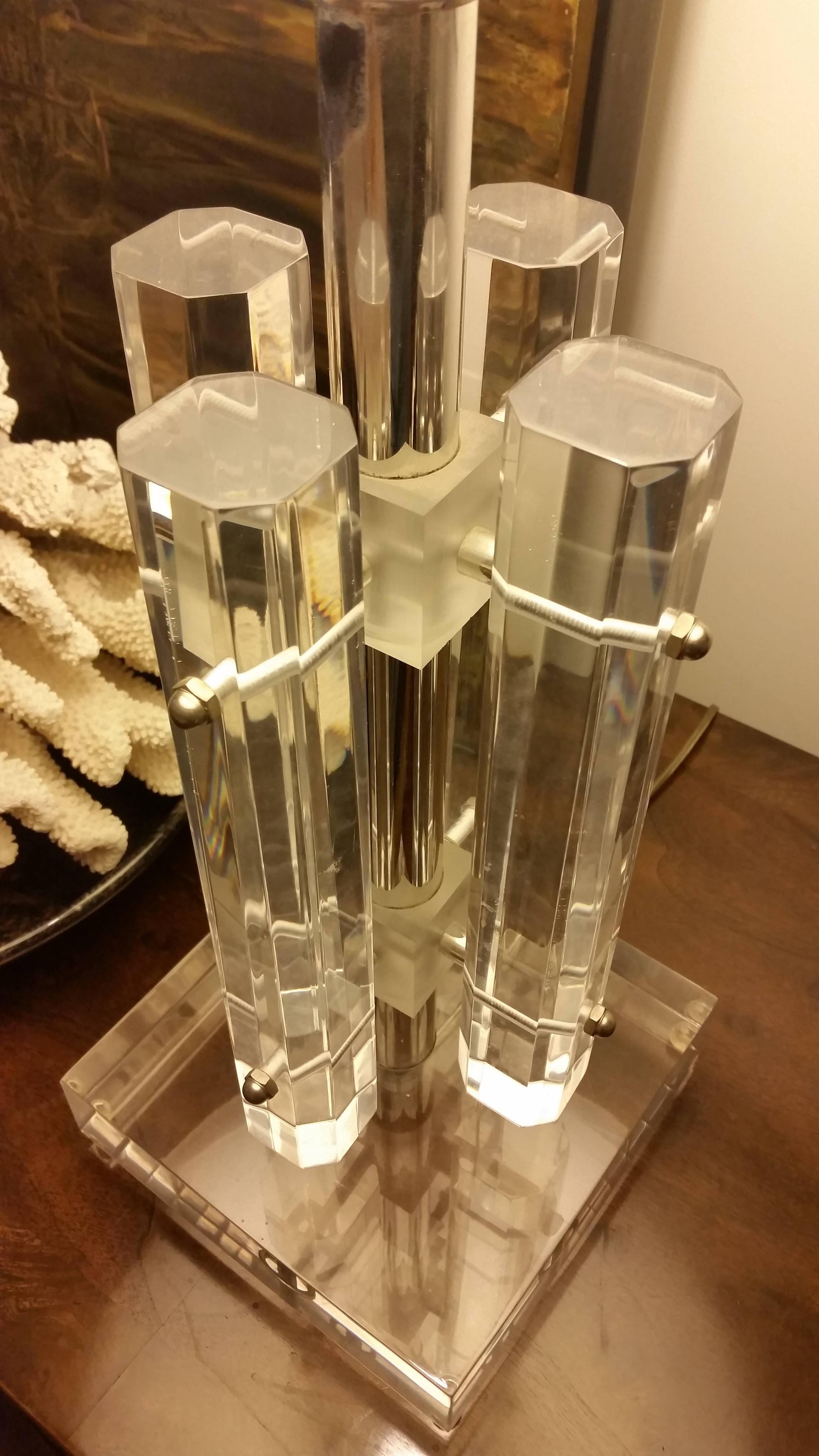 Lucite lamp with chrome accents. Shade not included.