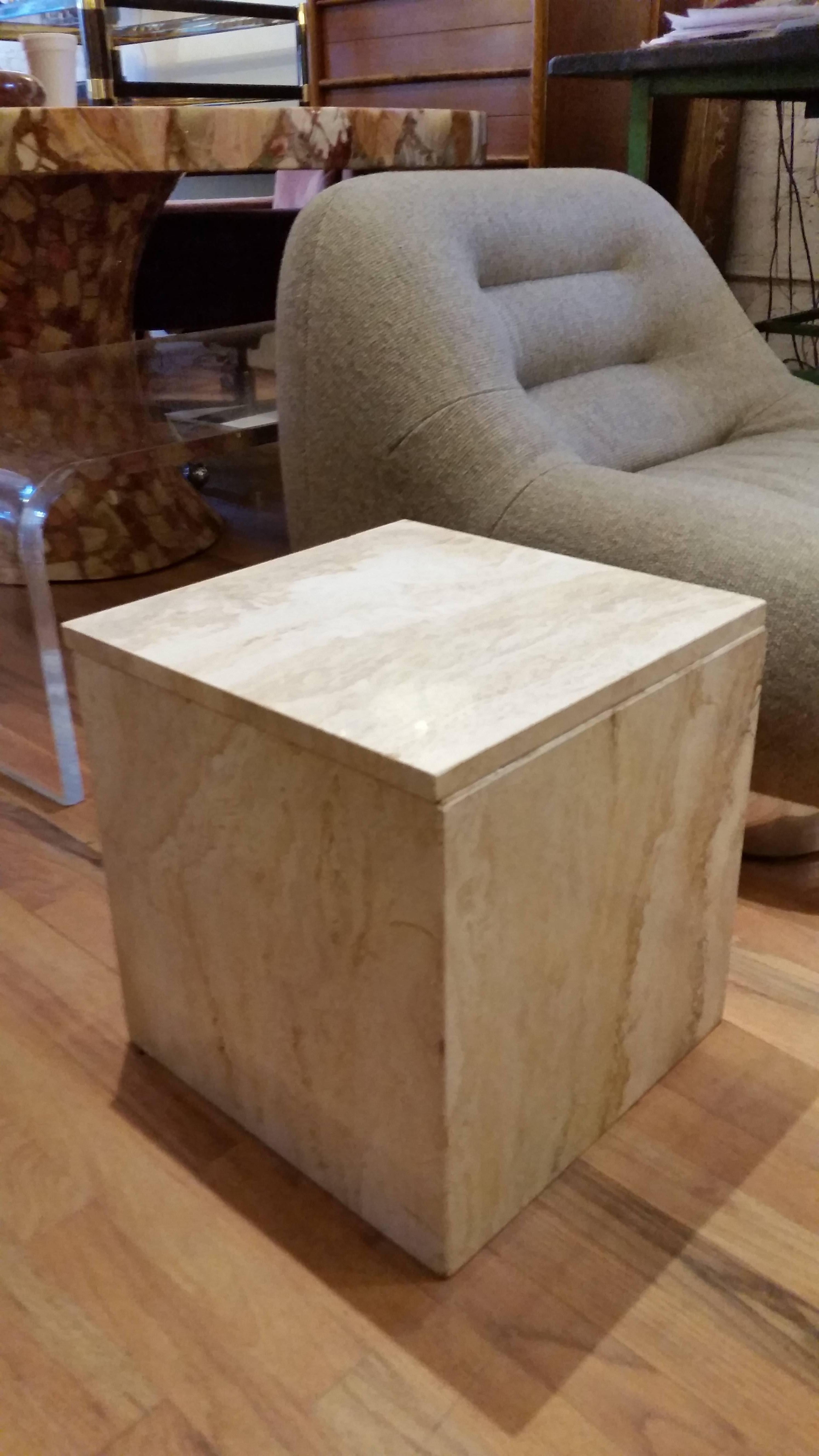 A well built custom Travertine end table.
Could work well as a small coffee table.