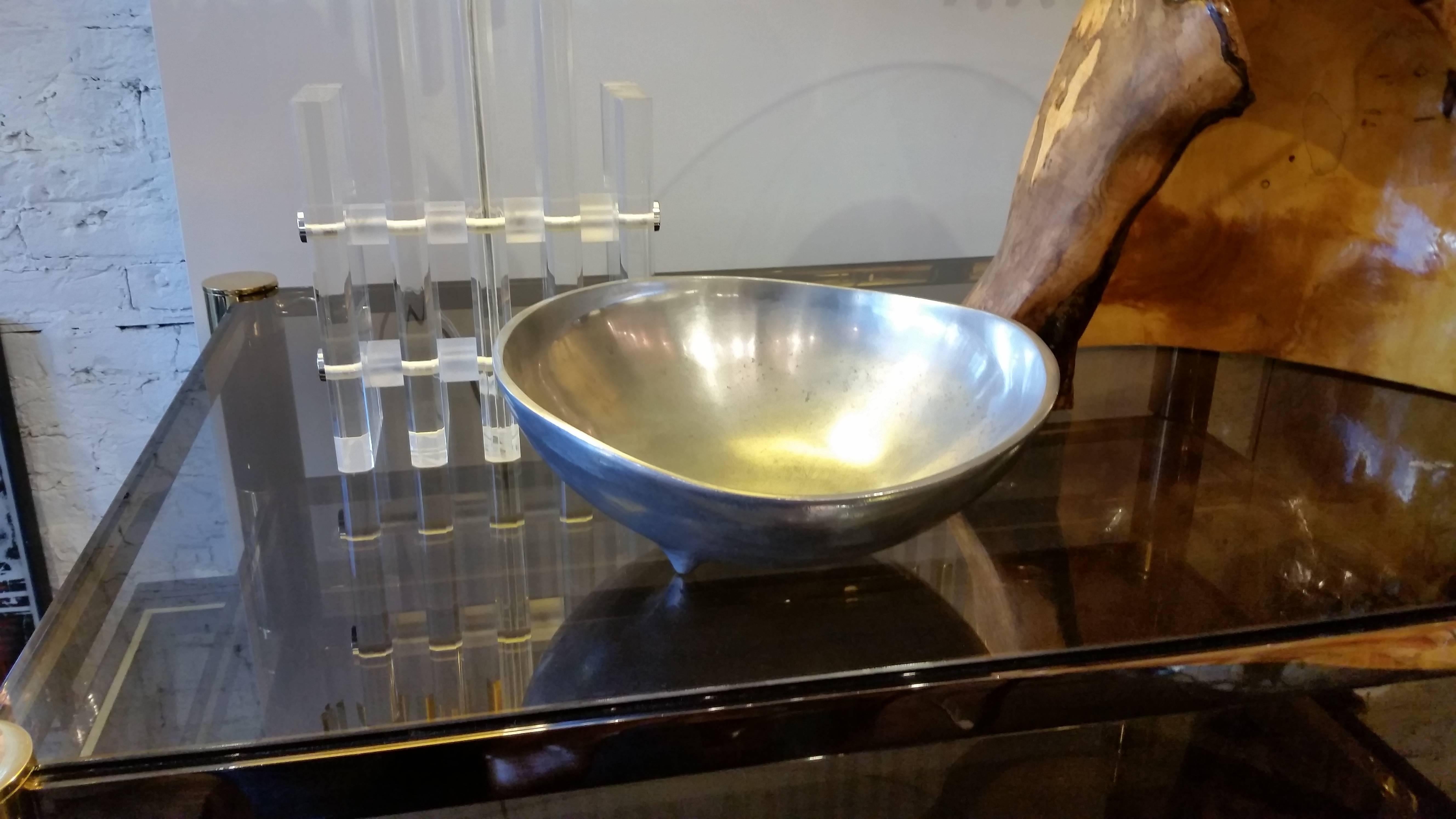 A textured hammered aluminium bowl by
noted metalsmith Bruce Fox for Wilton.
 