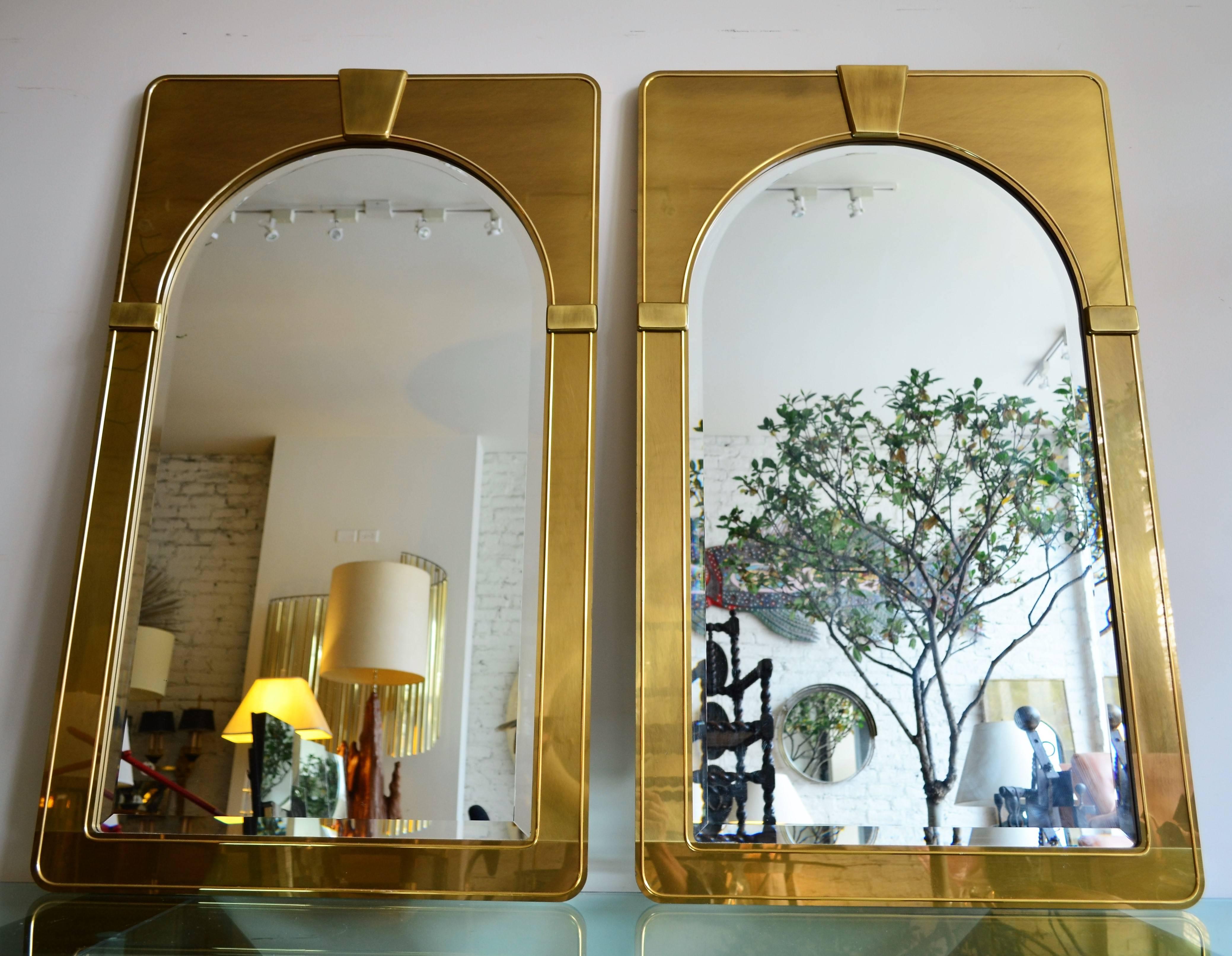 Mastercraft pair of brush brass arched Palladian beveled wall mirrors. 
Uber sophisticated stylized architectural detailing.
Ultra thin profile. Finest quality.