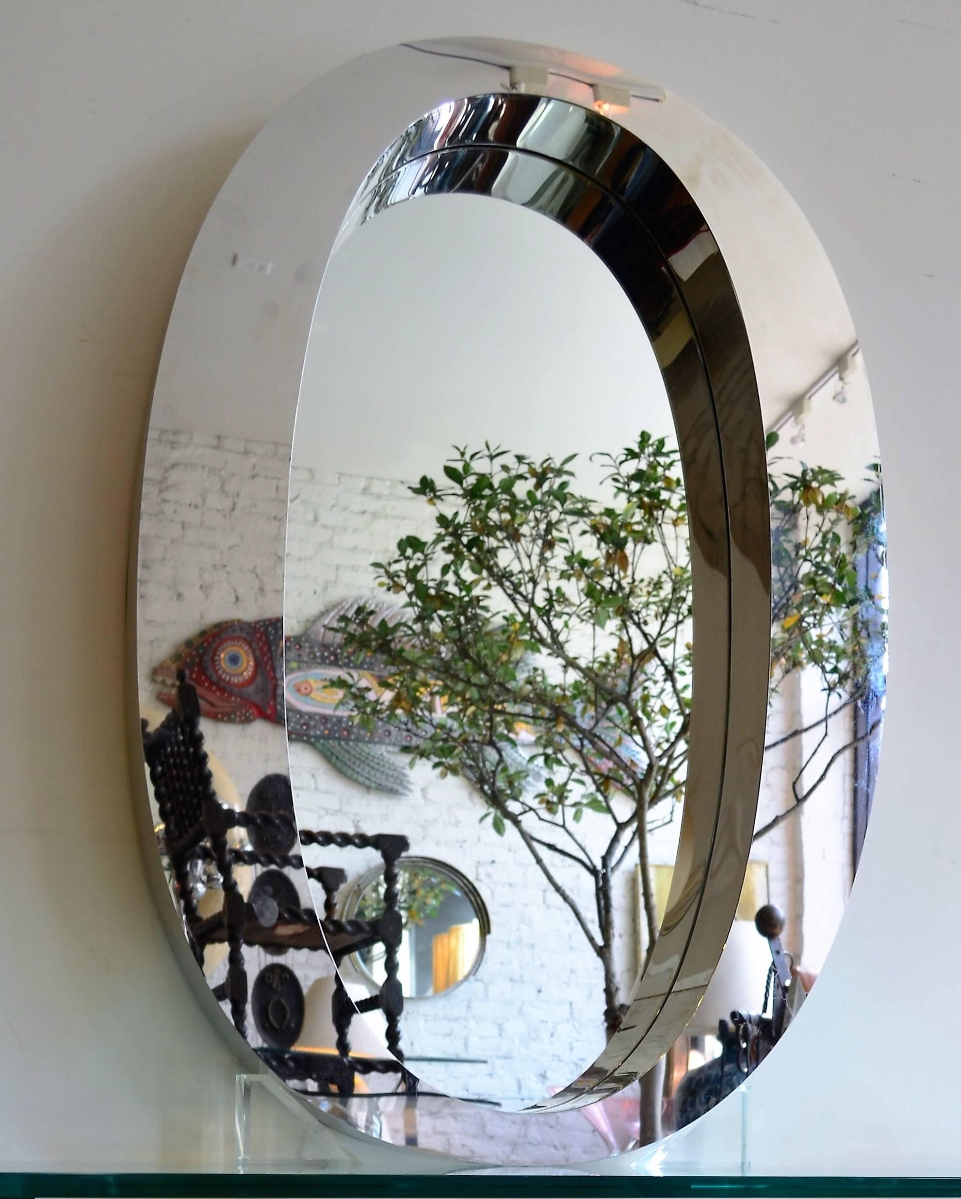 Originally this  chrome mid century piece was the address on the lobby of a prominent Chicago Wacker drive skyscraper.Beautiful rare piece.
We had custom mirror installed. Great large scale mirror.
Much bigger than Jere mirrors
Please call us for