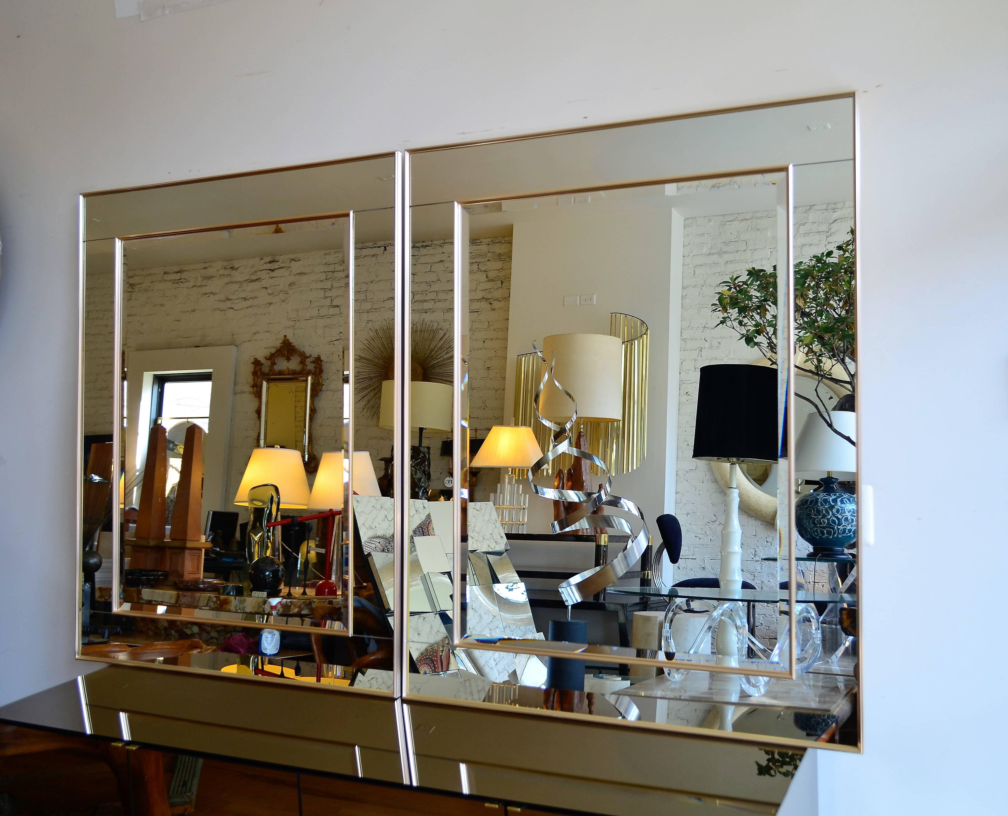 A pair of monumental metal La Barge mirrors with a
satin finish. These large mirrors are of the finest
quality. Could be hung vertically or horizontally.