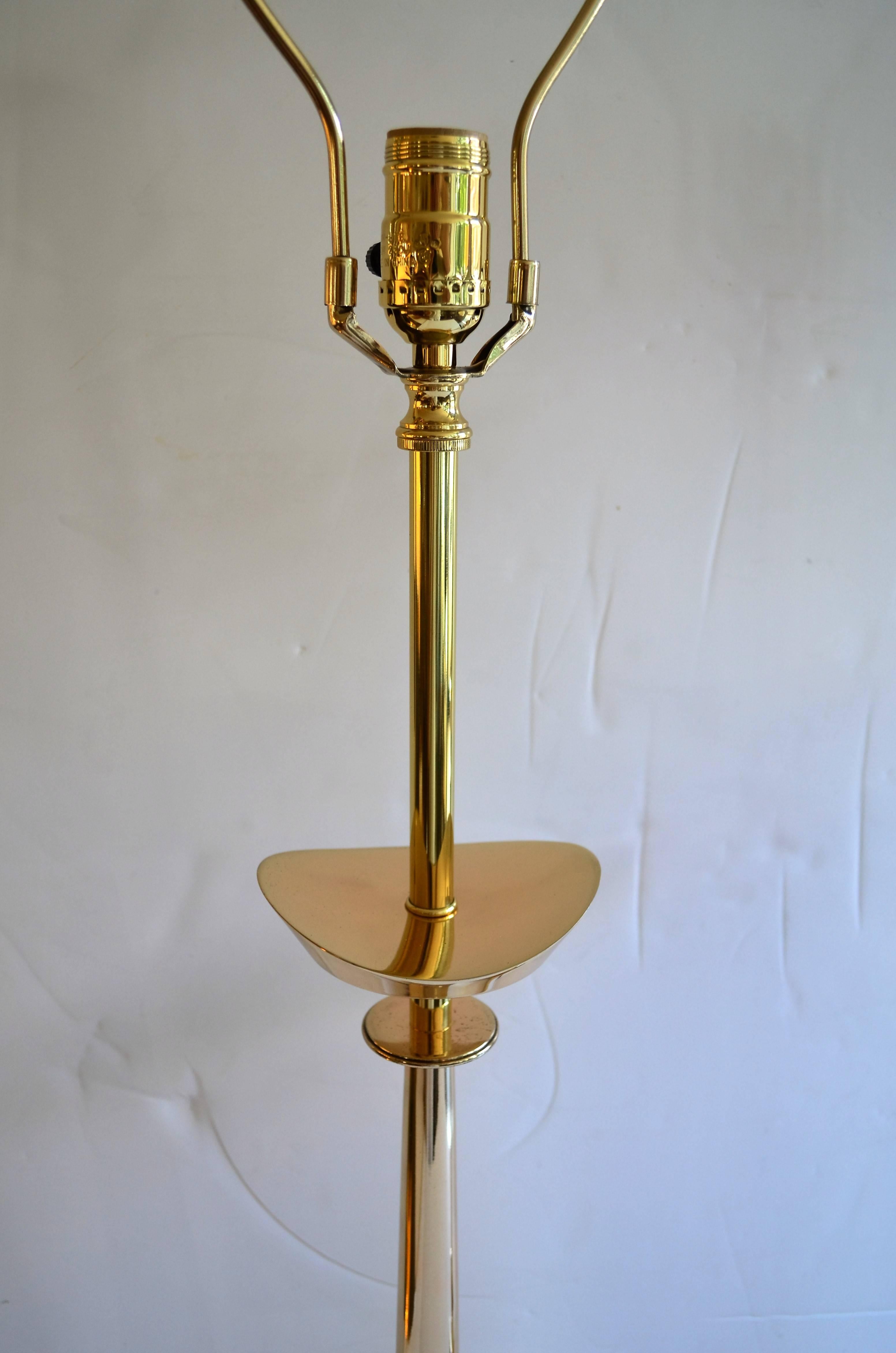 Tommi Parzinger style pair of brass lamps.
The pair have been professionally rewired. Shades not included.

  