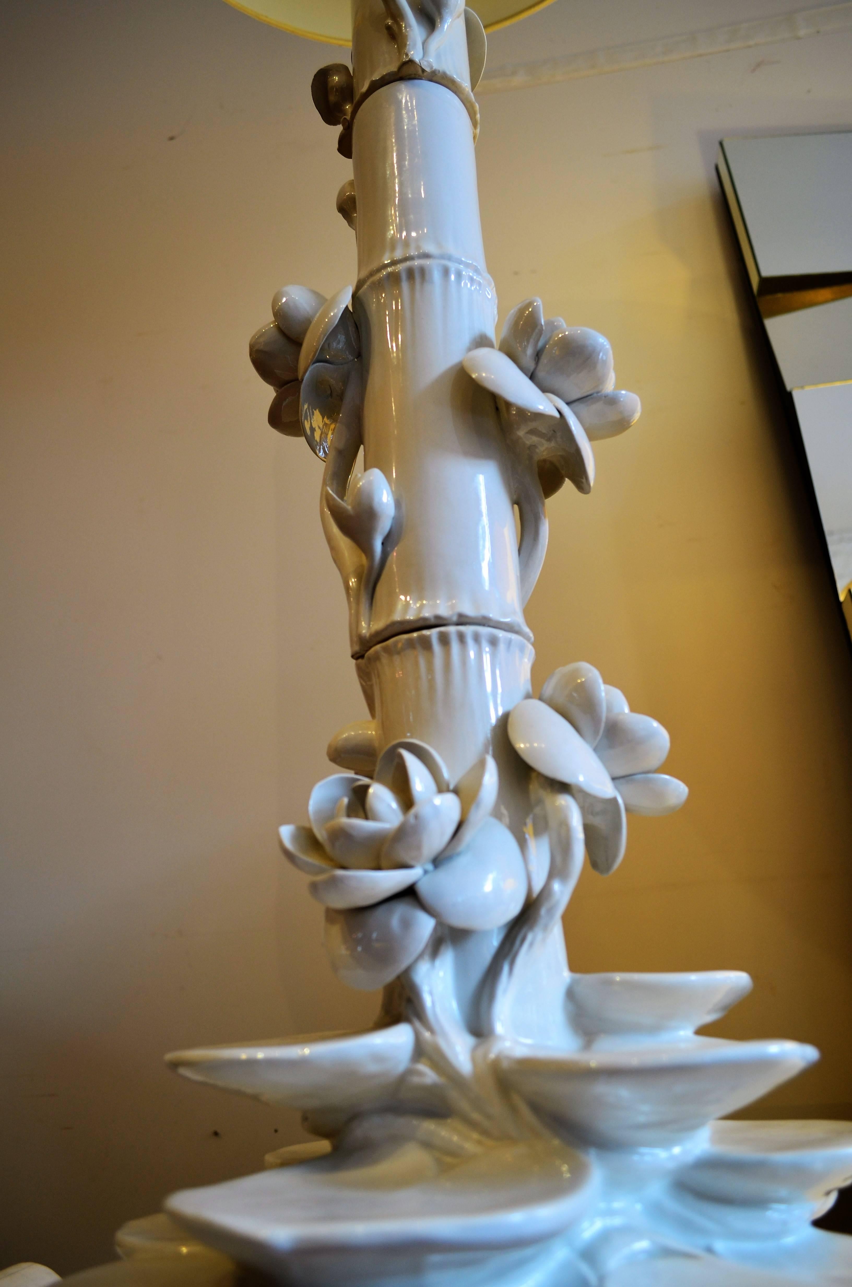 Italian ceramic lotus and bamboo floor lamp.
Fantastic Hollywood Regency profile. Shade not included.