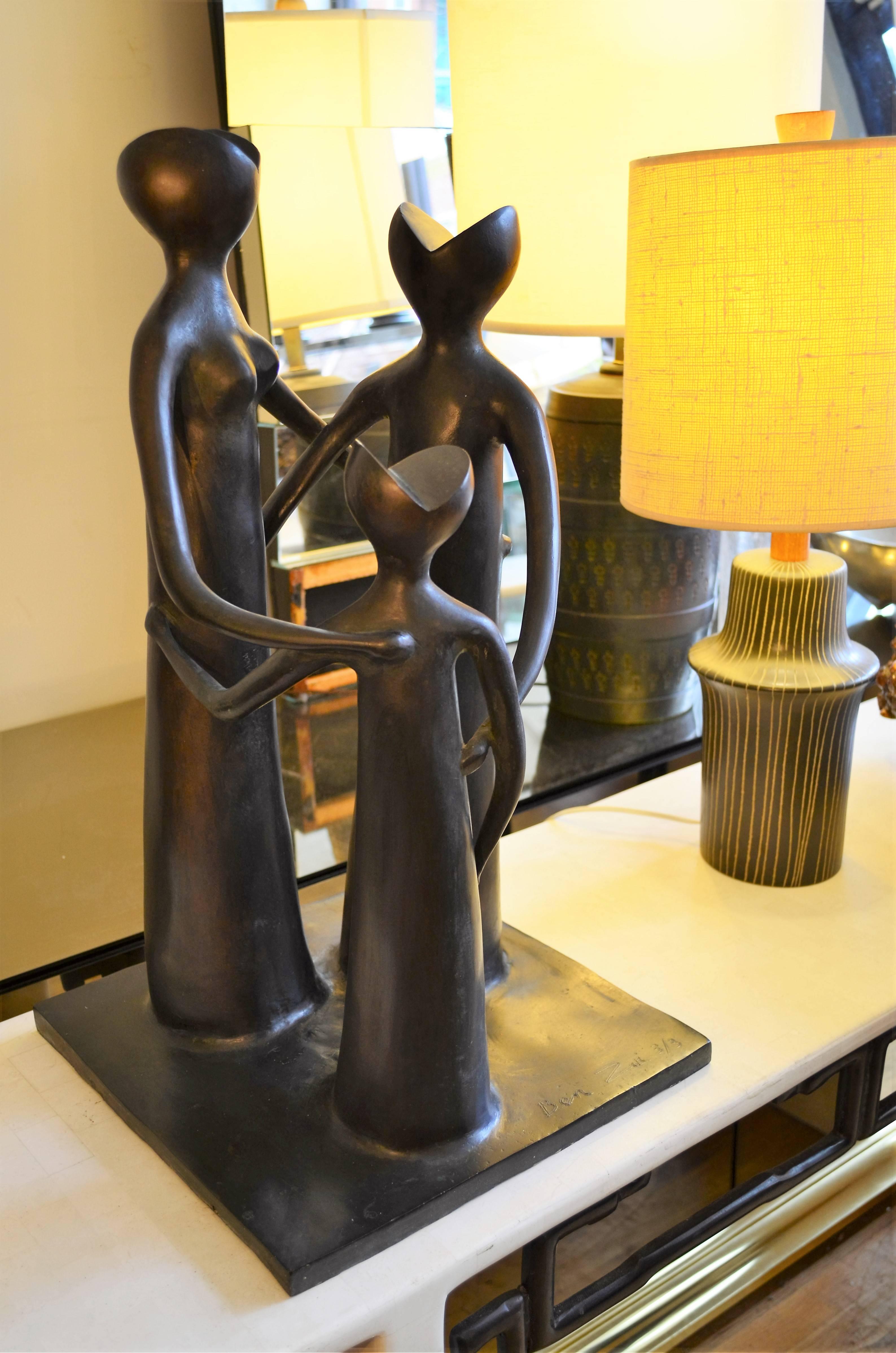 An outstanding Mid-Century large bronze abstract figural sculpture.
Three powerful figures in a joyful embrace. The piece is signed
Ben Zui 3/3. The artist is unknown.
Great from all angles, this sculpture would be great in either 
a home or