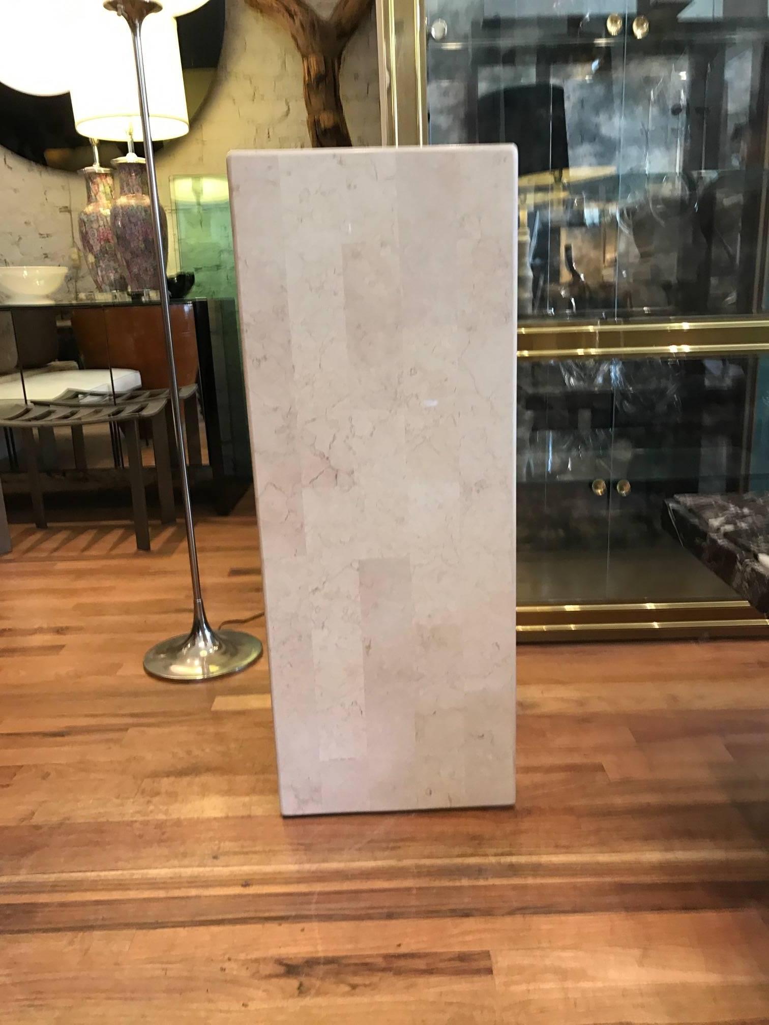 Nicely scaled Mid-Century tessellated stone pedestal. Unlike the typical tessellated surface of Maitland Smith pieces, these tessellated stone pieces are substantially larger.