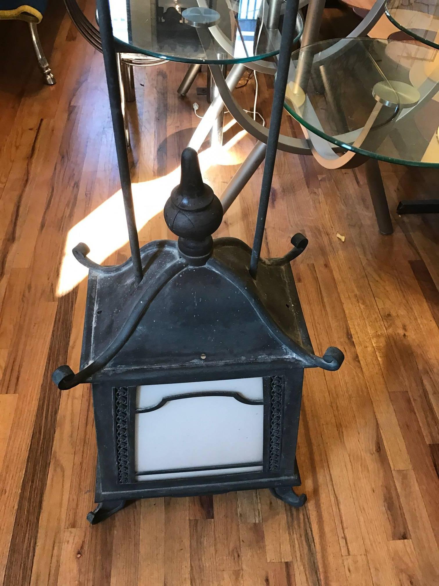 Chinoiserie pagoda style hanging lantern. The pagoda style lamp was originally hanging in the port cochere of the pool house at Wynwyd. Wynwyd constructed in 1922 is an Italian style villa overlooking the Indian Hill Country Club in Winnetka