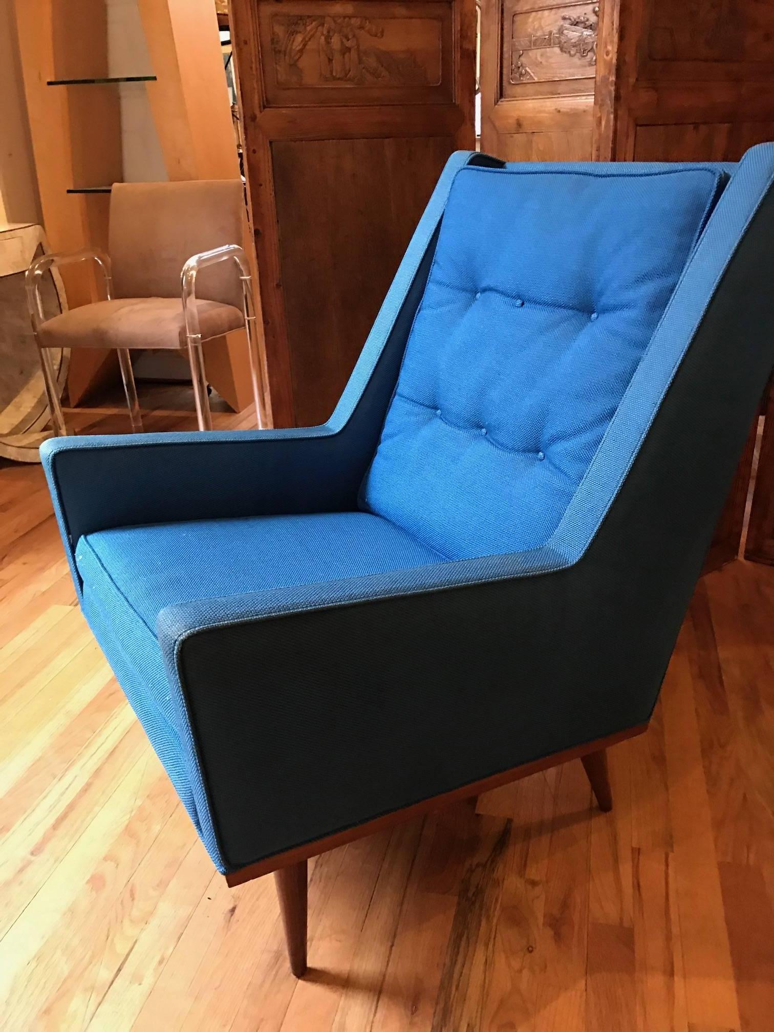 A Classic Mid-Century Milo Baughman lounge chair for James Inc. The upholstery is original. The base and legs are solid walnut.