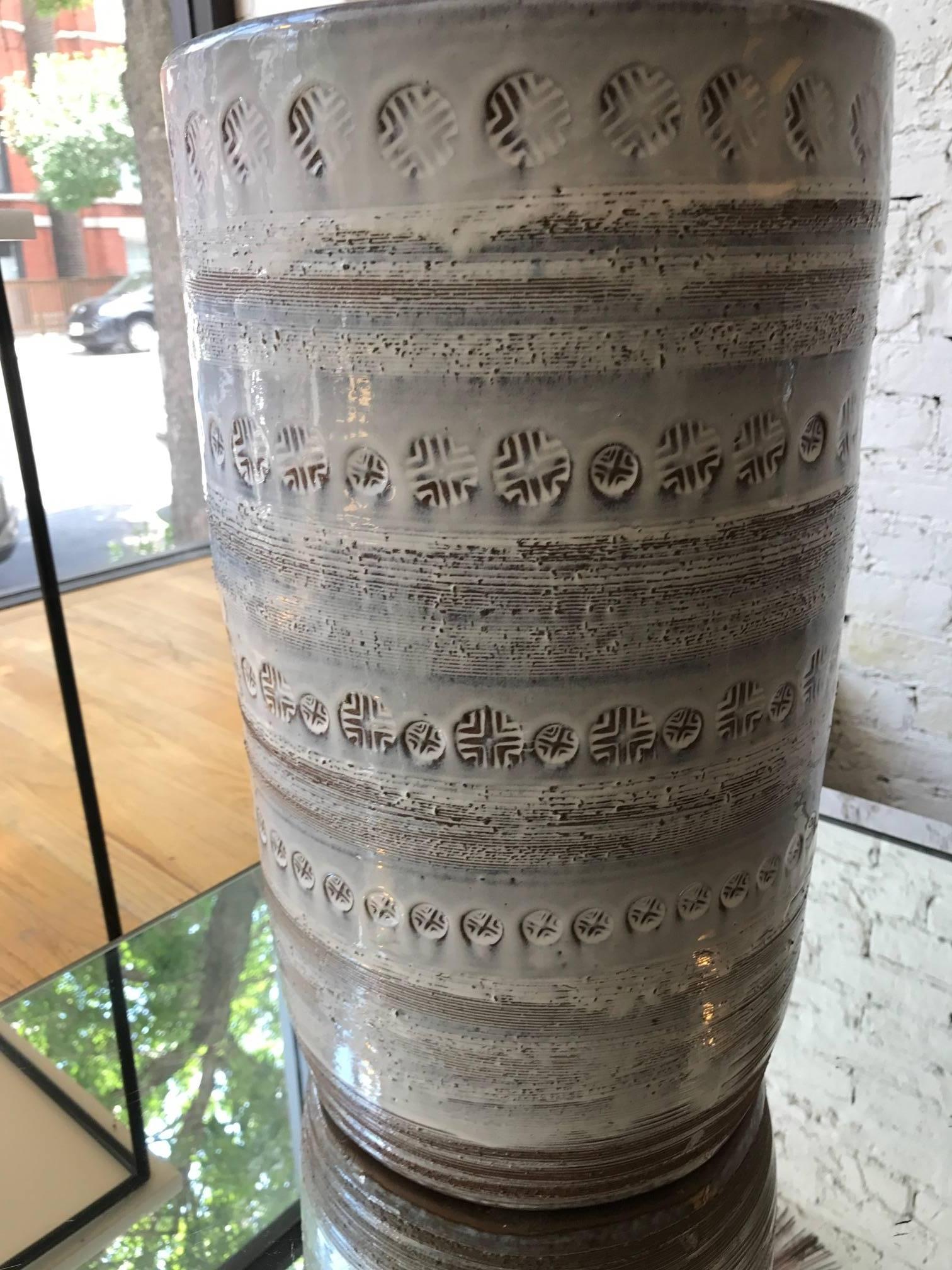 A tall ceramic Bitossi umbrella stand or large vase. The piece has incised overall decoration.