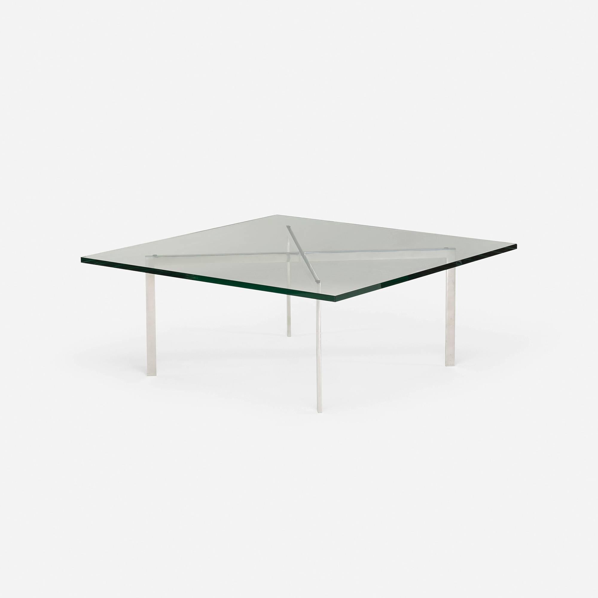 Gerry Griffith produced Barcelona tables in Chicago prior to production by Knoll. His versions are identified by sharp corners at the intersection and bends of the base.