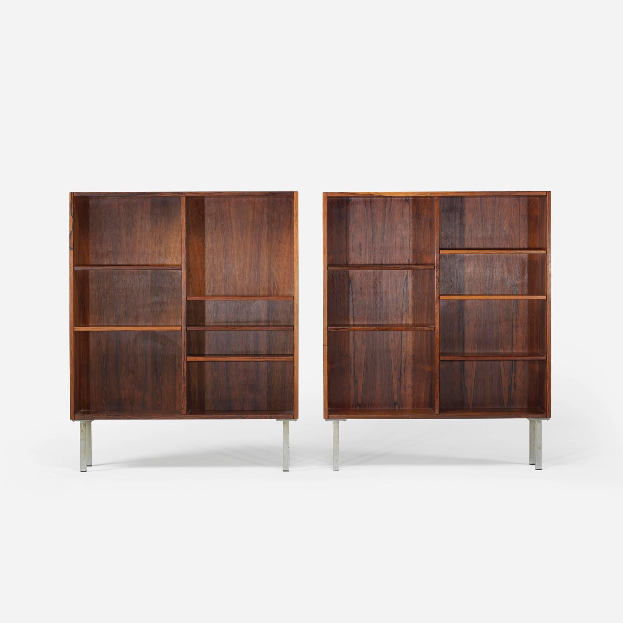Each bookcase features five adjustable shelves that can be configured in numerous ways.