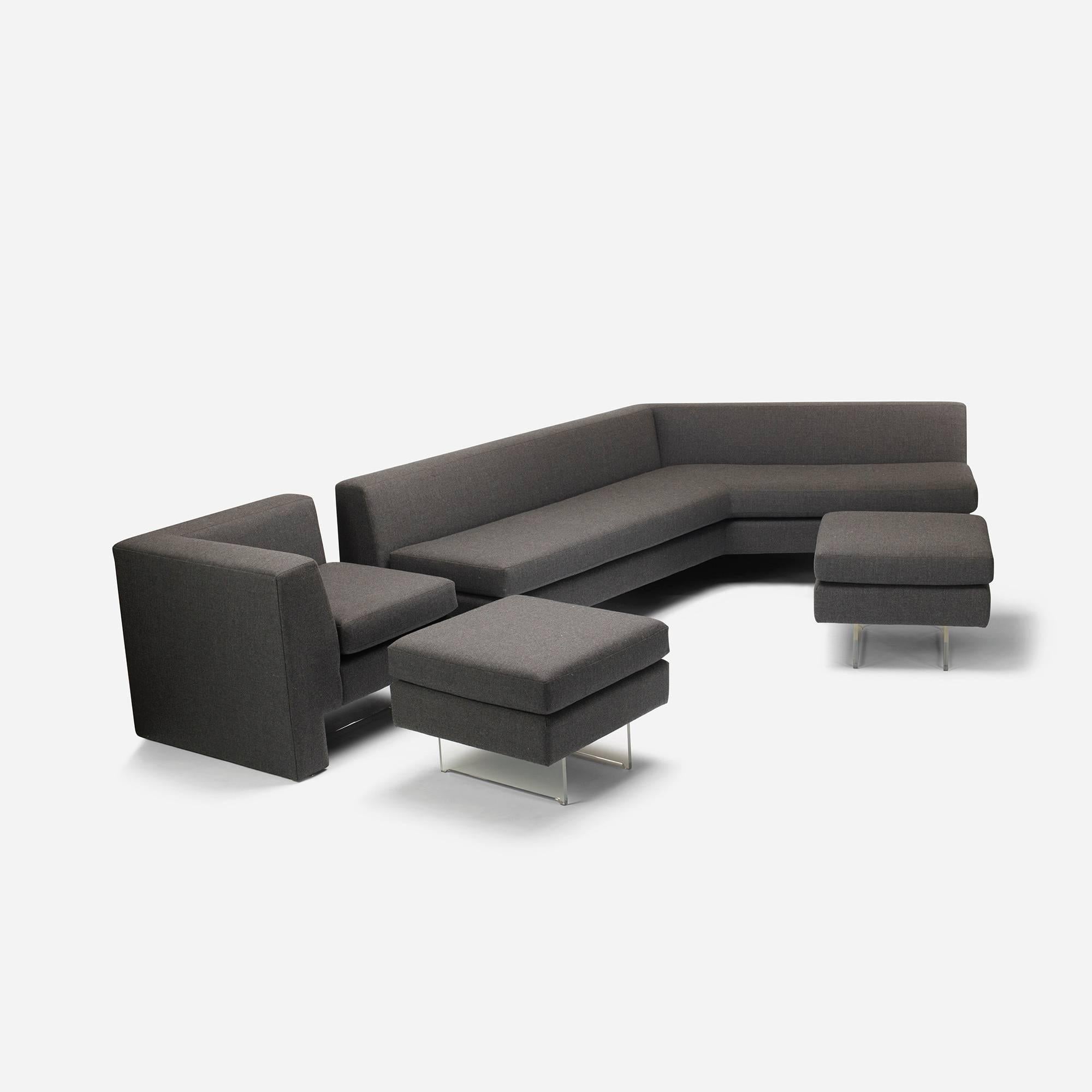 Sectional is comprised of four components; one sofa, one corner unit and two ottomans.