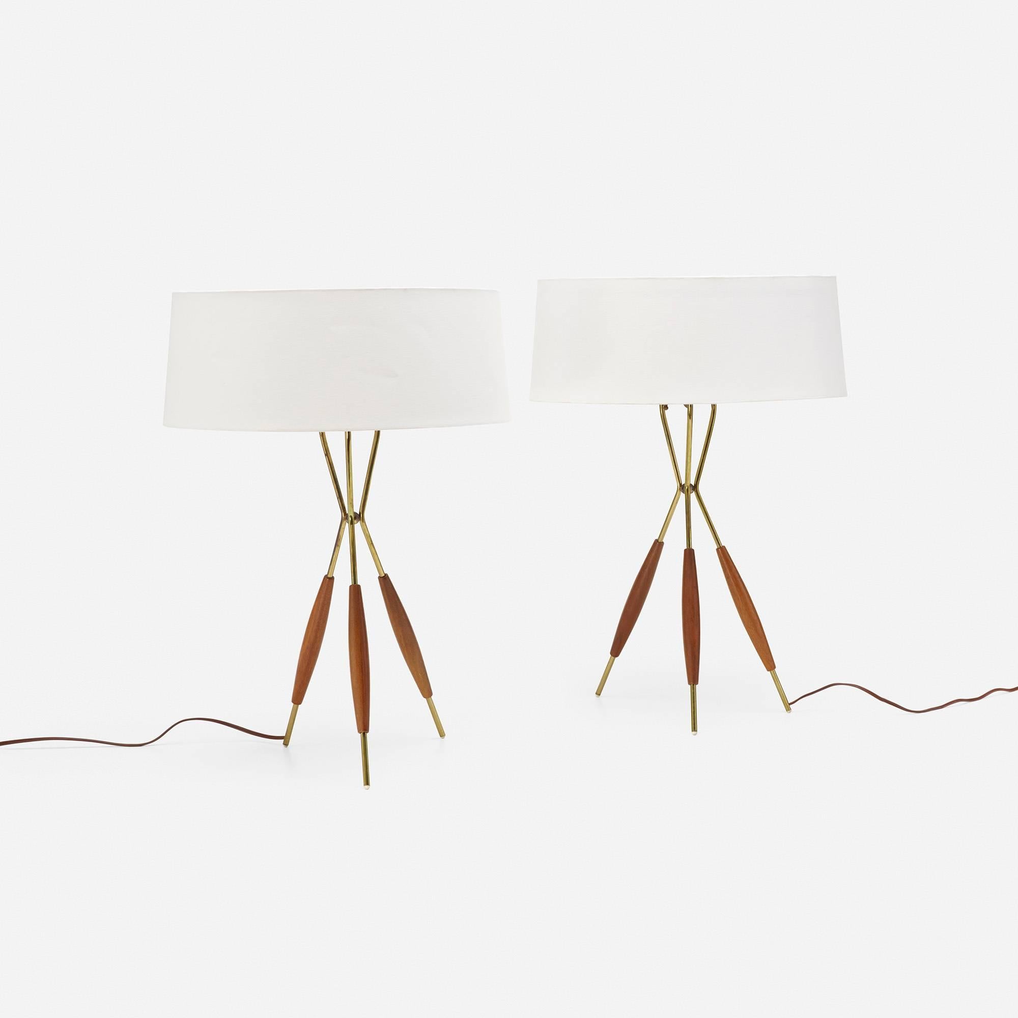 Classic Mid-Century lighting with walnut and brass accents.