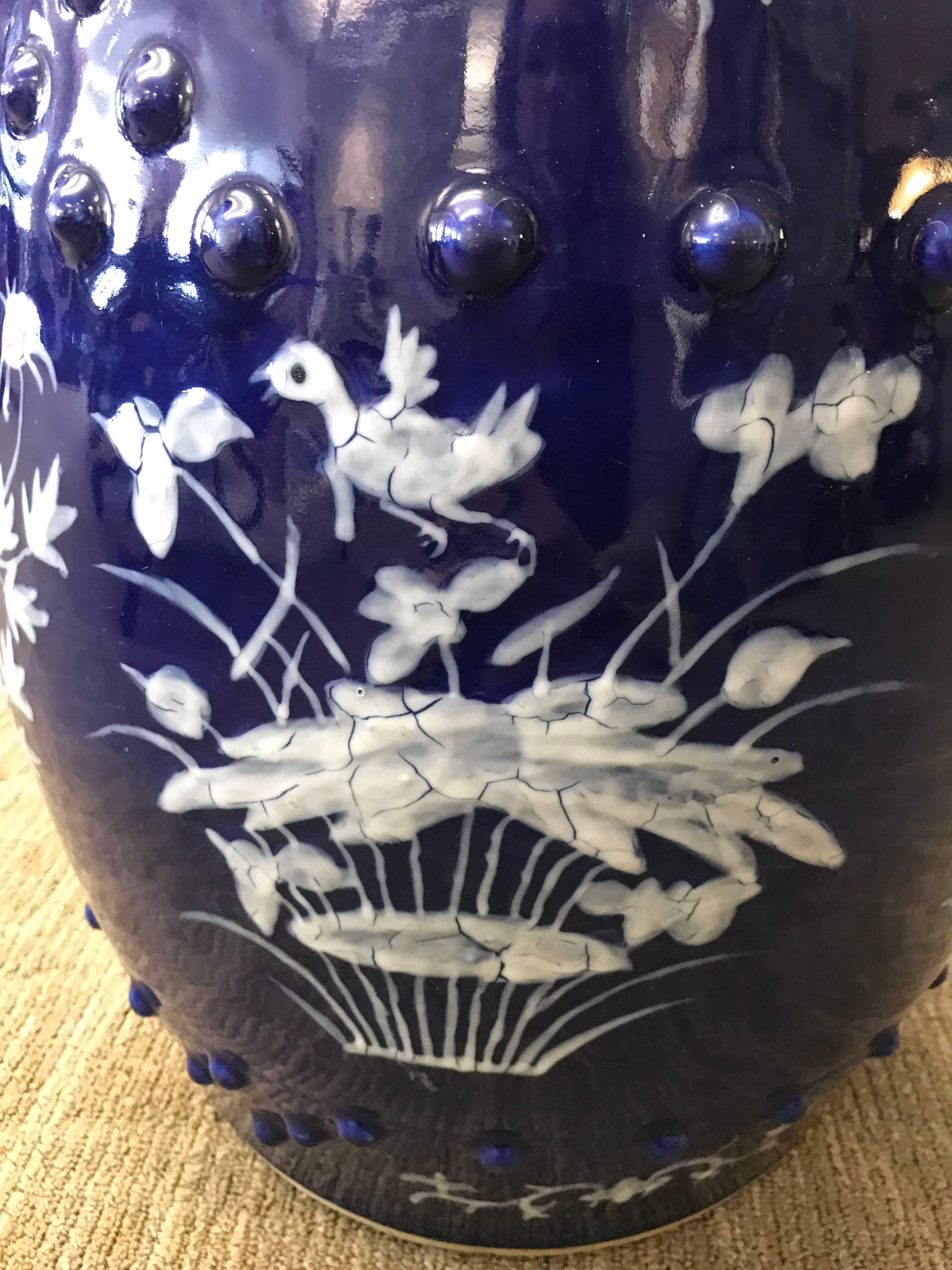 A Chinese blue and white garden seat with floral design.