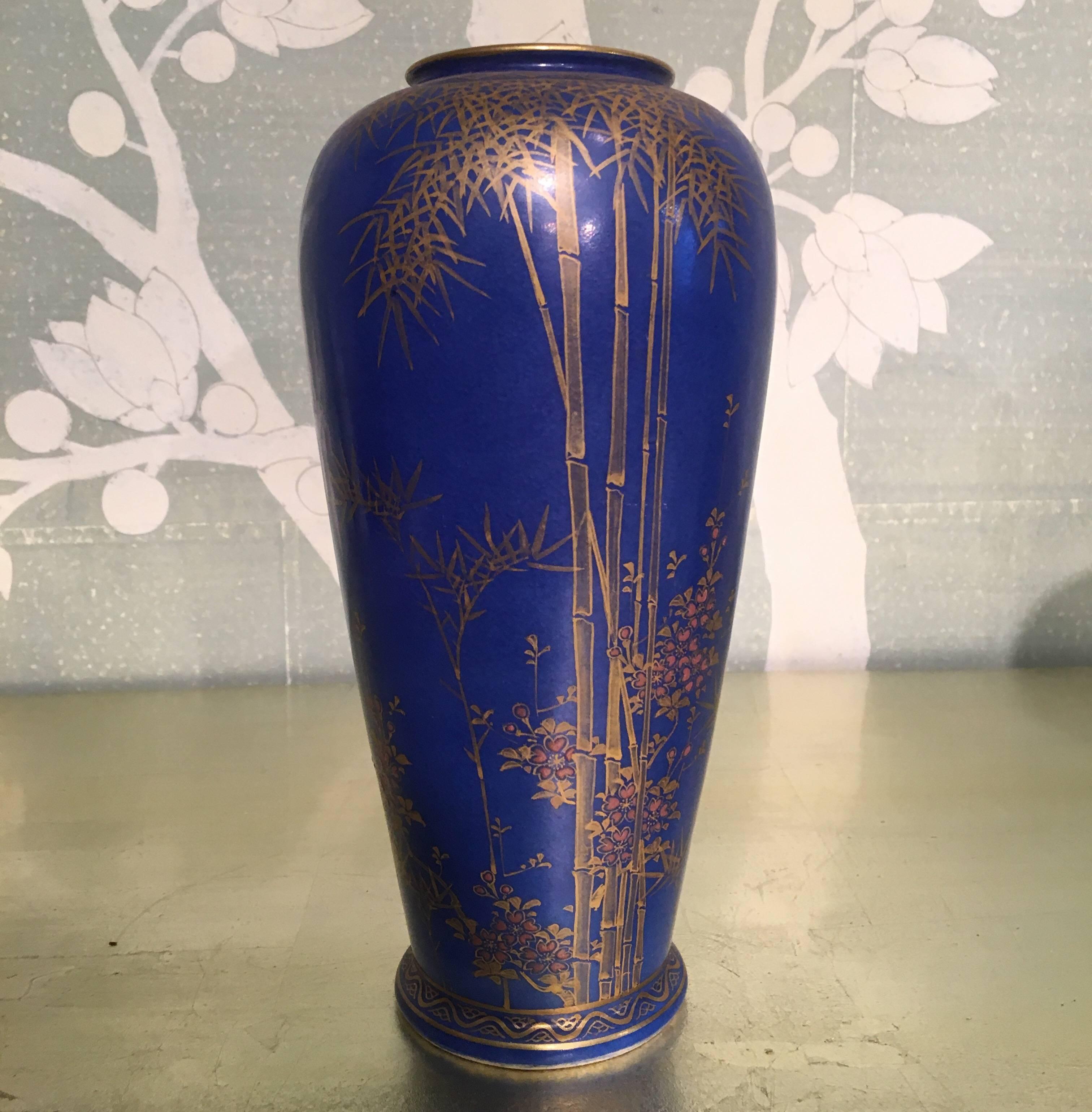 A pair of mid-20th century Japanese cobalt blue vases with design of bamboo.