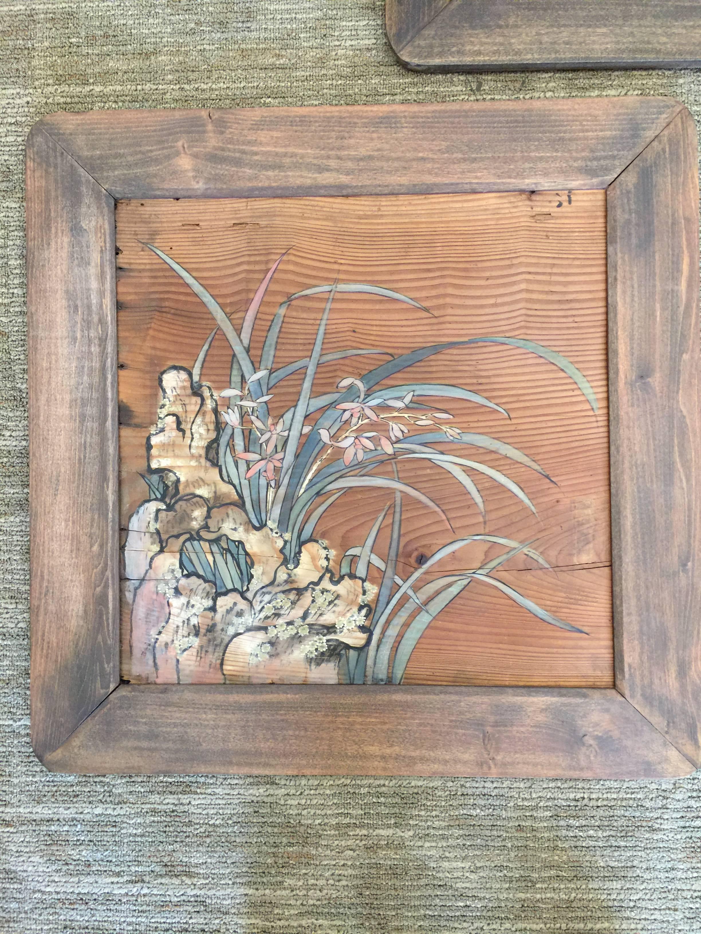 A very pretty and interesting set of three antique Japanese paintings of flowers, on wood panels, framed in simple wood frames.

For sale individually, or as a set.
