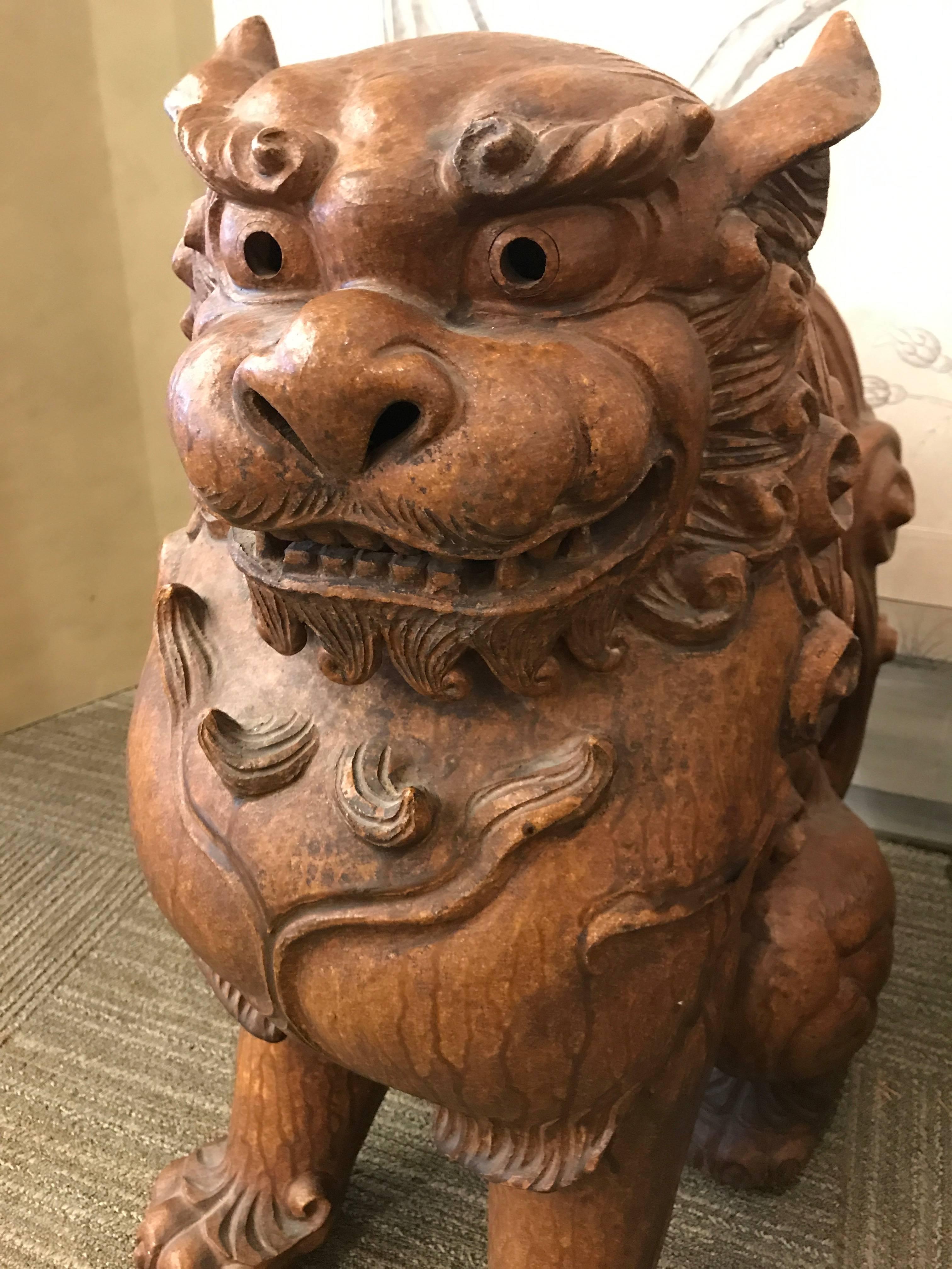 A spectacular vintage pair of pottery guardian dogs (Koma-Inu). Such dogs were often placed outside a temple to ward off evil and guard the Buddha.

 