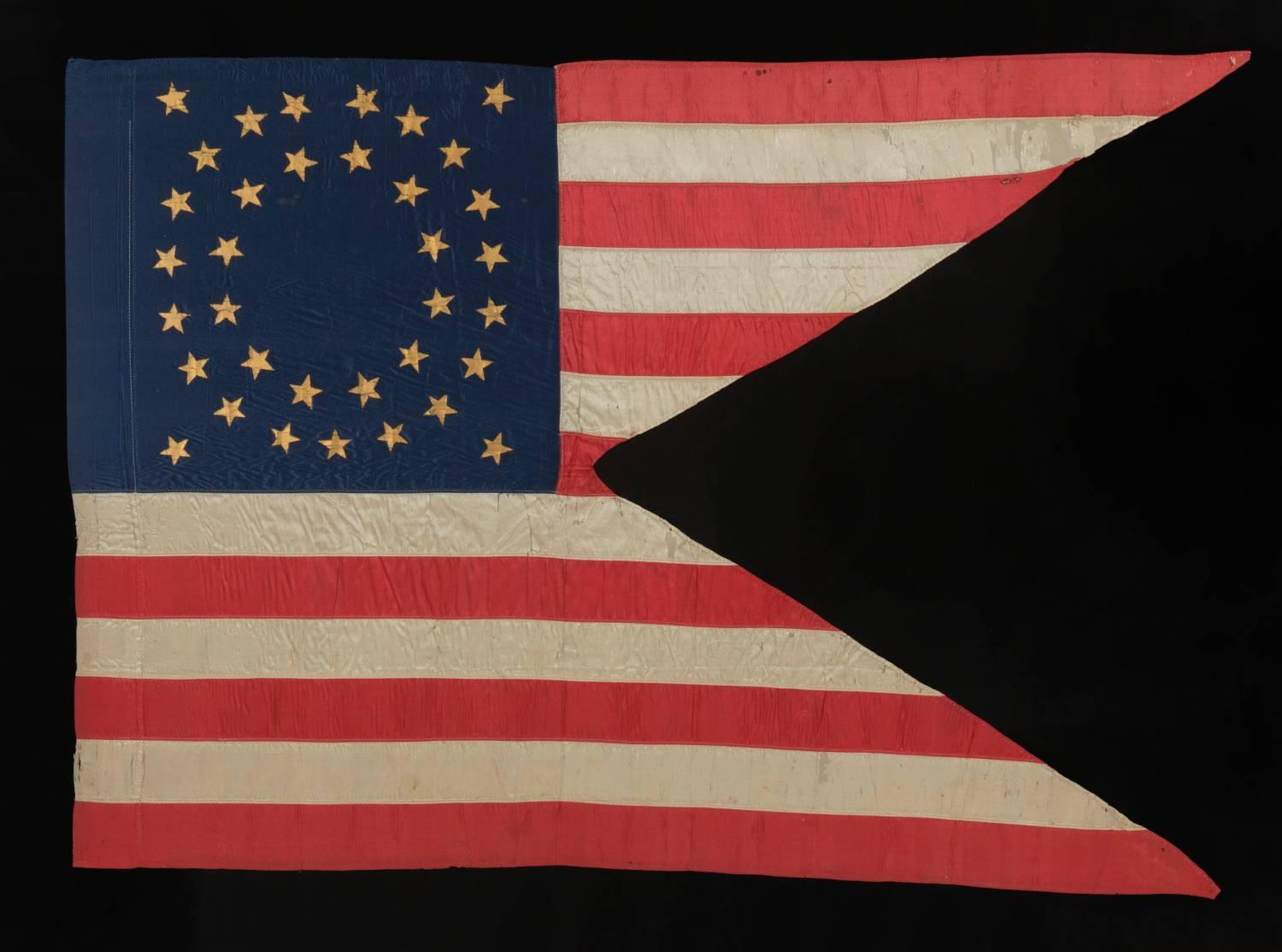 35 star silk cavalry Guidon with gilt-painted stars, in an exceptional state of preservation, Civil War period, 1863-1865:

Military issued, Union Army, Civil War battle colors are one of the "Holy Grail's" of the flag collecting world.