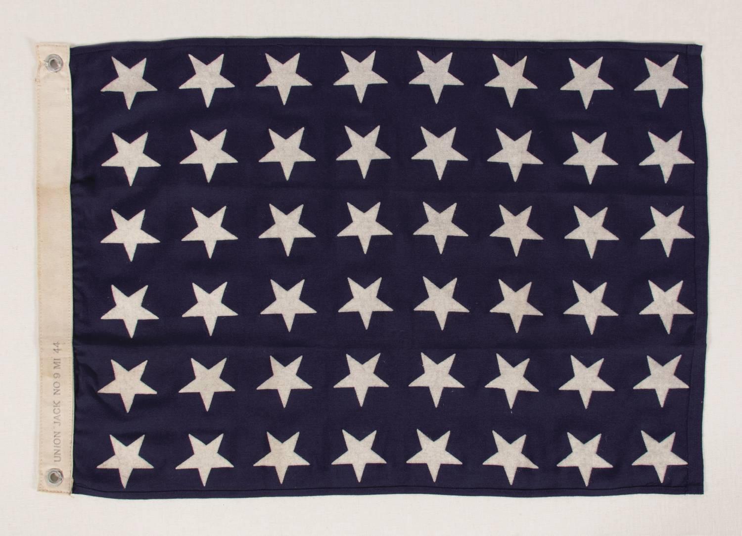 48 star U.S. Navy jack, made at mare Island, California, headquarters of the pacific fleet, during WWII, dated 1944:

 United States Navy jack with 48 stars, made during WWII (U.S. involvement 1941-1945) at Mare Island, California, Headquarters of