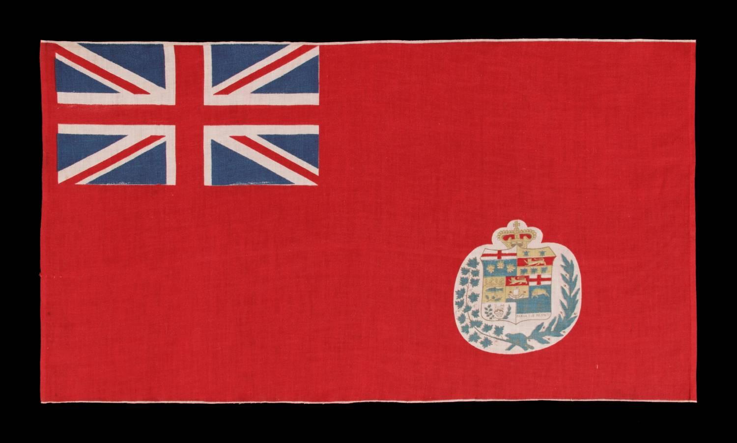 Canadian version of the British red ensign, a parade flag on its original staff, 1873-1905.

Canadian version parade flag, printed on cotton, in the design used between 1873 and 1905. This was one of the earliest versions of the basic design flown
