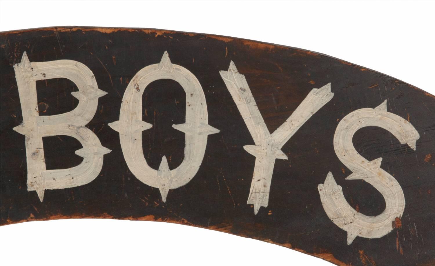 Black-painted American sign with beautiful lettering in a 19th century style, in a crescent-shaped design, probably made for over-door display. Dating shortly after the Civil War 1866-1880, the sign was made to honor Union Army & Navy veterans.