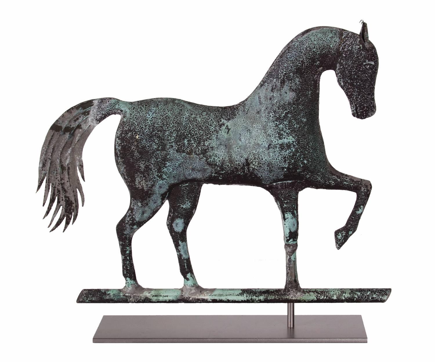 Prancing horse weathervane, attributed to Jewel & Co. Waltham, Massachusetts, circa 1860:

Prancing horse weathervane by A.H. Jewell & Co., Waltham, MA. Made of molded copper with a cast zinc head, applied copper ears and a sheet copper tail, this