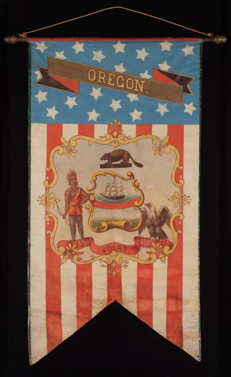 HAND-PAINTED PATRIOTIC BANNER WITH THE SEAL OF THE STATE OF OREGON AND GREAT FOLK QUALITIES, 1861-1876:

Swallowtail format, patriotic vertical banner bearing the name and the seal of the State of Oregon. Made in the period between 1861 and the 1876