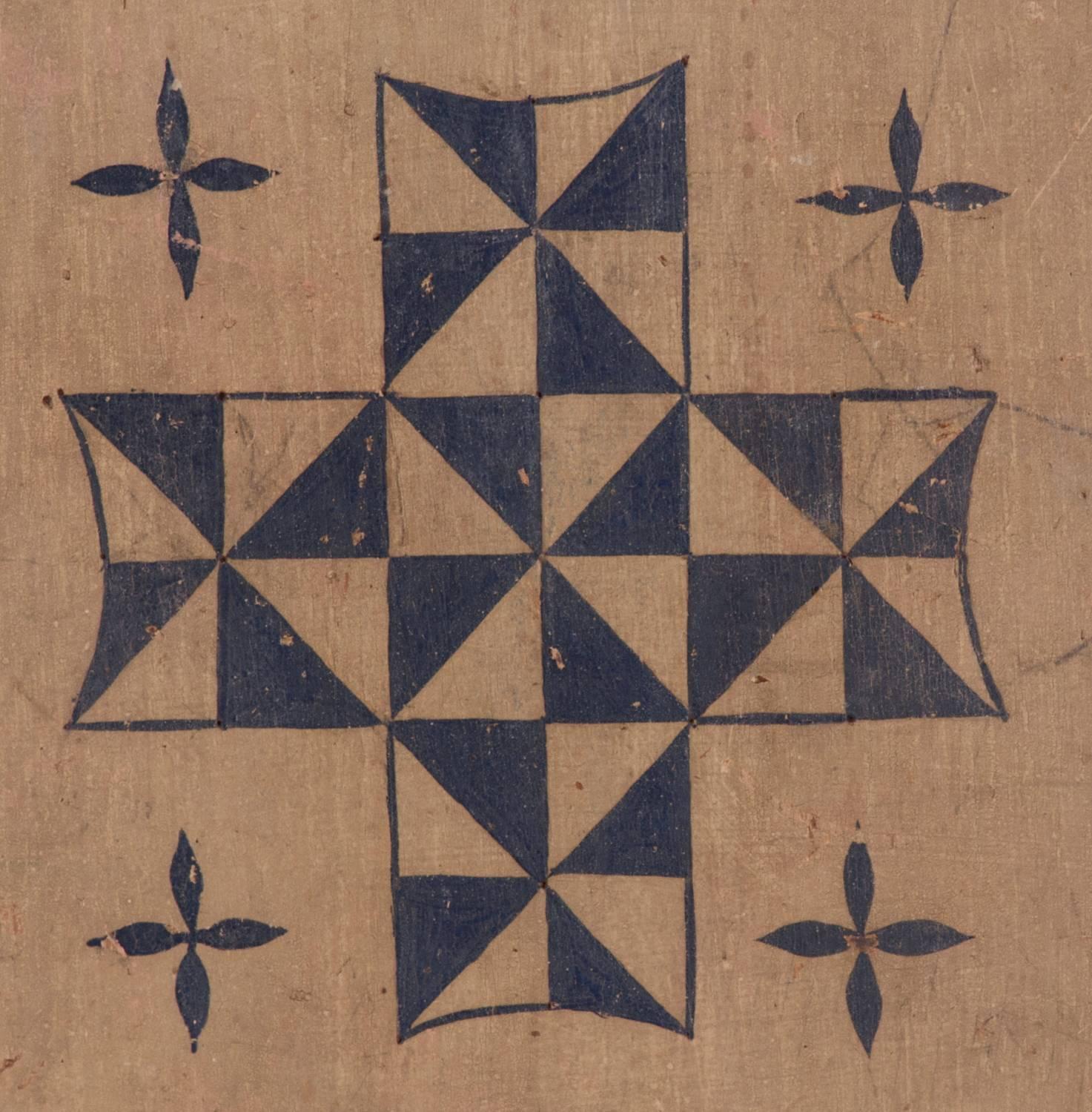 Masterpiece quality combination fox and geese and mill game board, in original and untouched red, ochre white and blue paint, with pinwheel quilt pattern design in the centre and a winding vine border, circa 1820-1845, with checkers on the reverse,