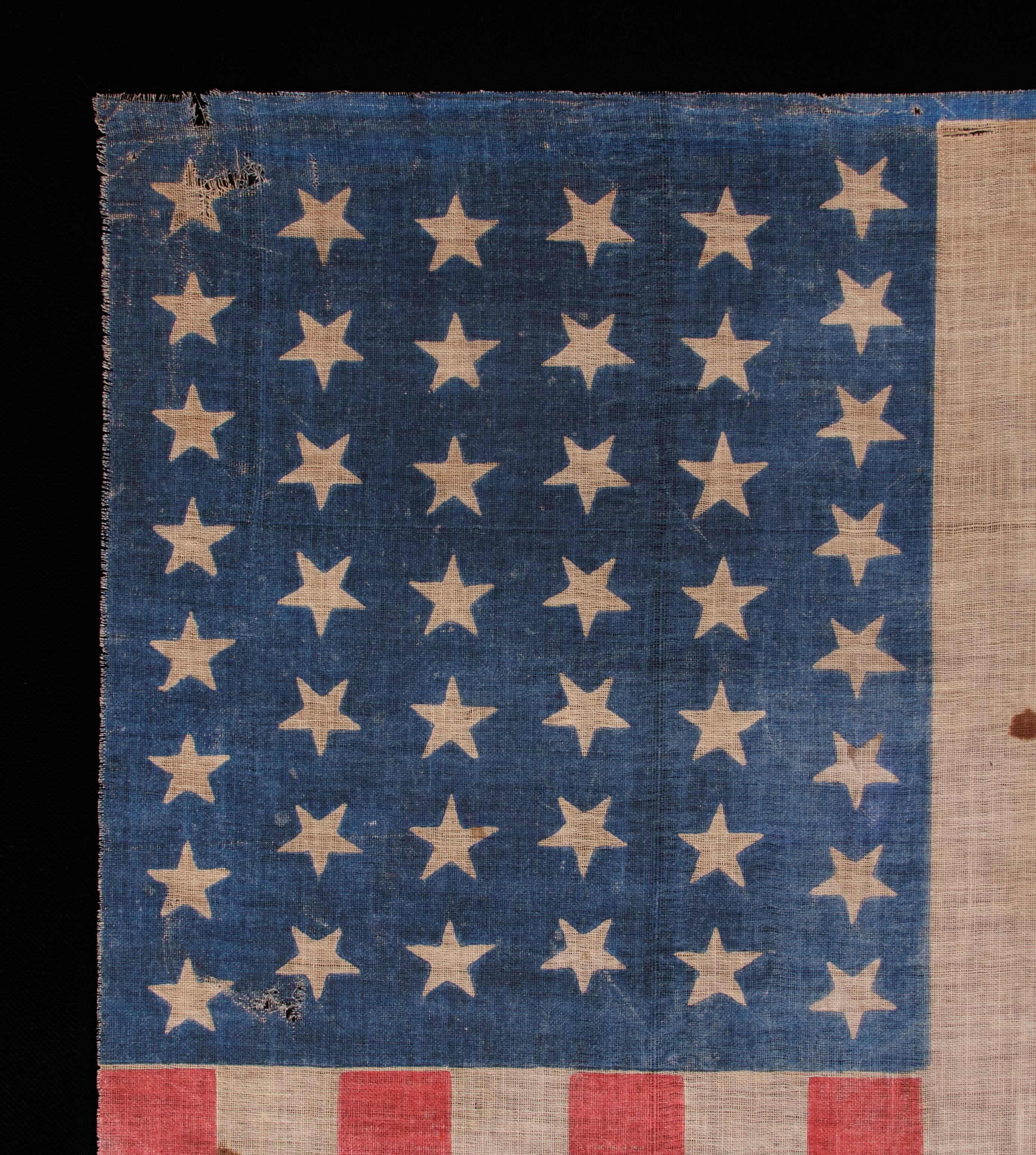 44 Stars in Dancing Rows in an Hourglass Formation, on an Antique American Flag In Good Condition In York County, PA