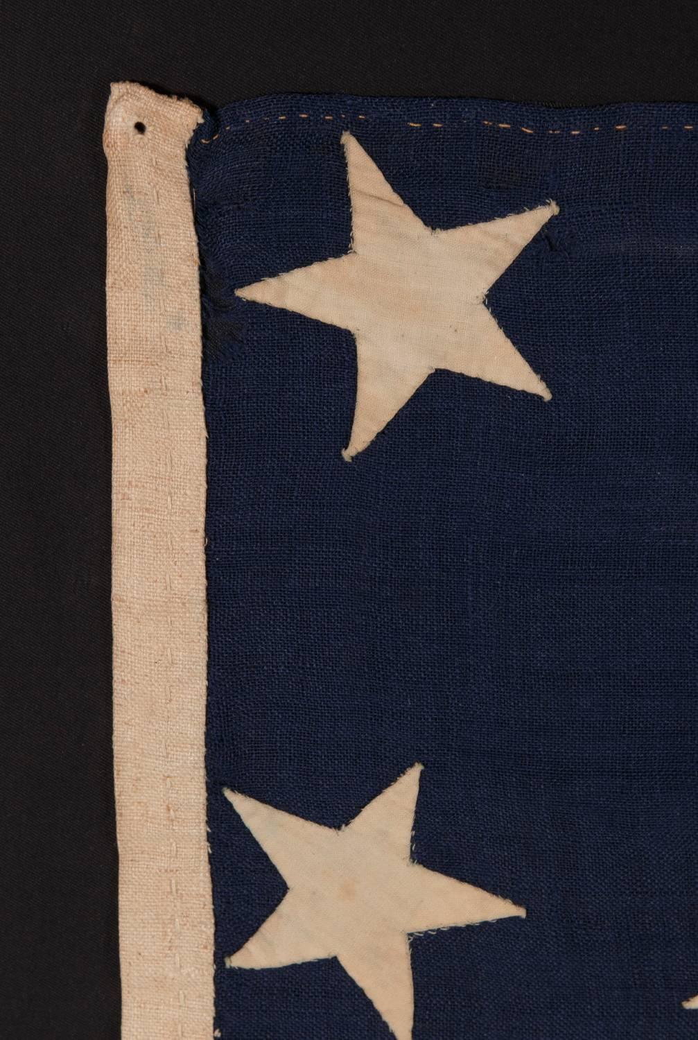 Mid-19th Century 13 Entirely Hand-Sewn Stars, U.S. Navy Small Boat Ensign of the Civil War Period