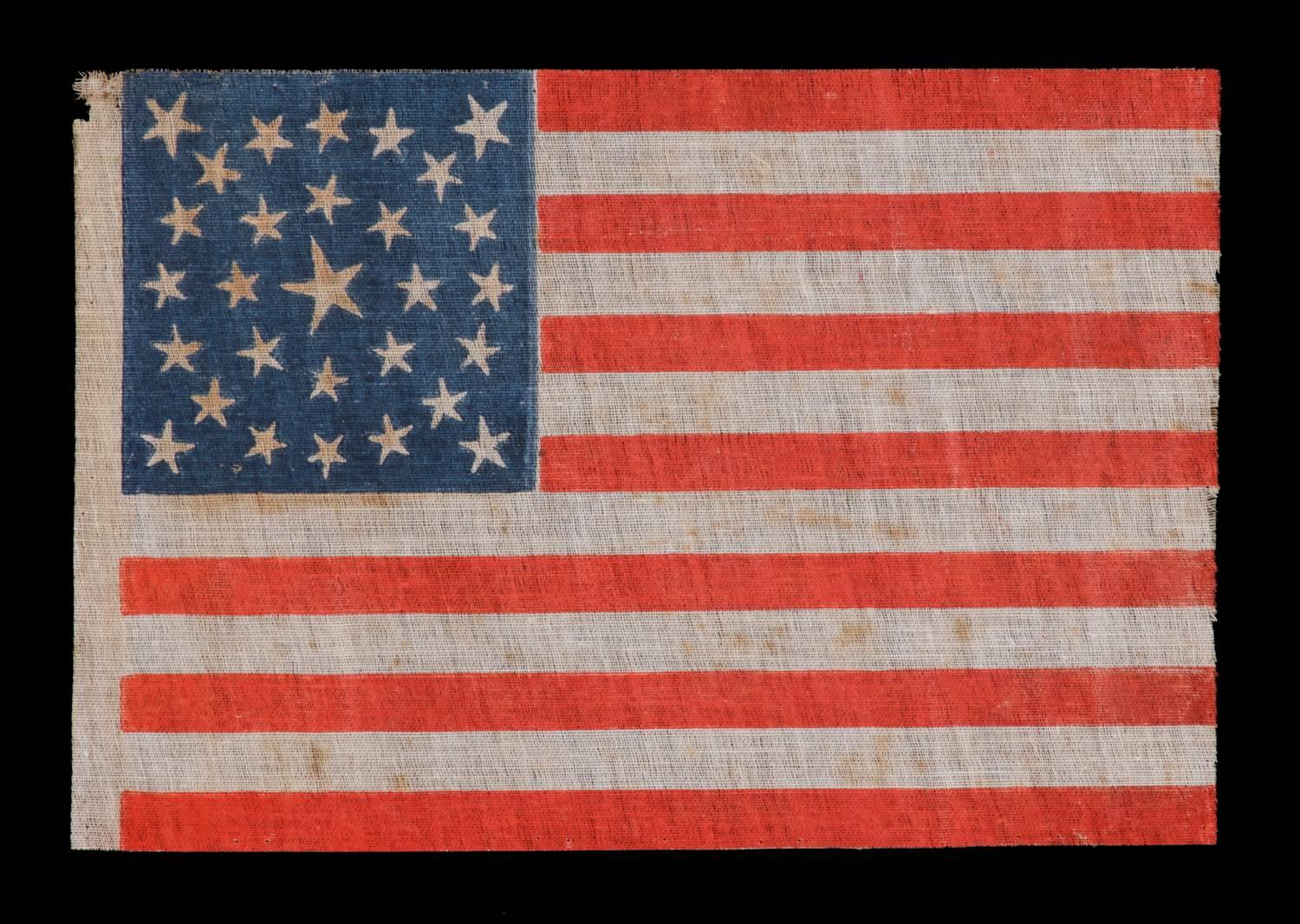 Antique American flag with 29 whimsical stars in a medallion configuration, iowa statehood, pre-civil war, 1846-1848:

29 star American national parade flag, printed on coarse, glazed cotton. The stars are arranged in a double wreath pattern with