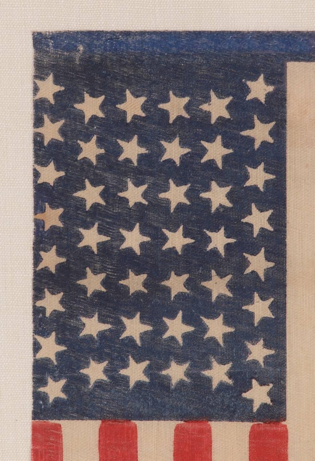 44 Tumbling Stars in an Hour Glass Formation, on an Antique American Parade Flag In Good Condition In York County, PA