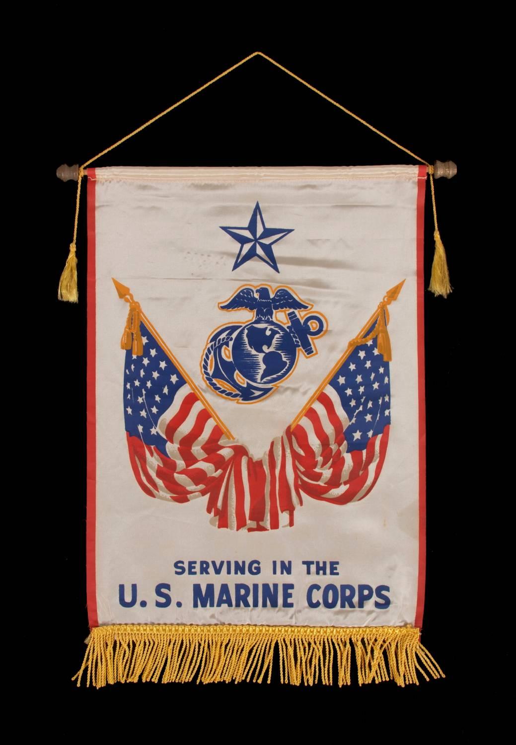 WWII Son-in-Service banner for a United States Marine, in a large-scale among its counterparts, graphic, and extremely scarce:

 The practice of displaying a son-in-service banner became popular during WWI (U.S. involvement 1917-1918) and was